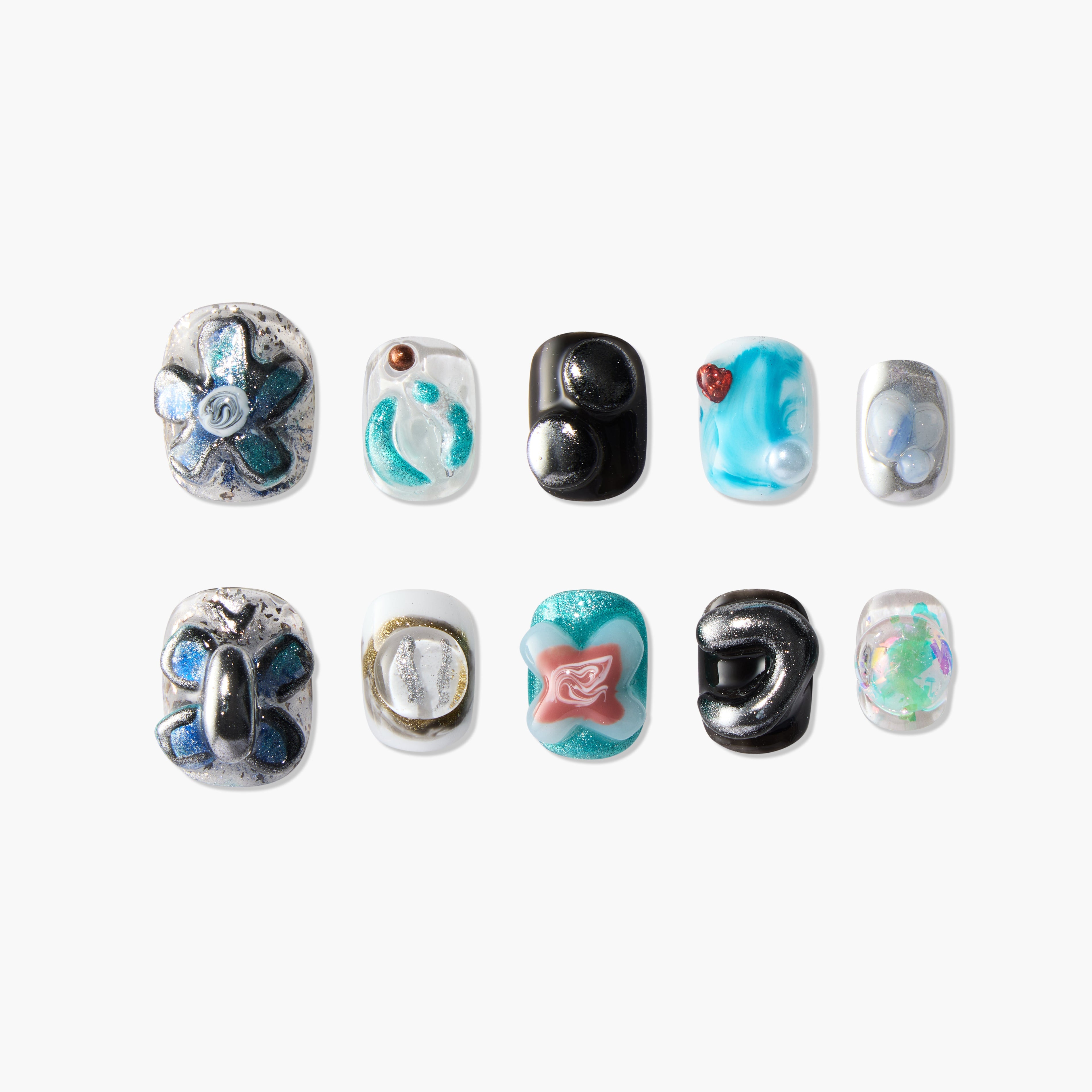 Handmade press-on nails set with 3D flower, heart, and abstract designs in blue and silver tones
