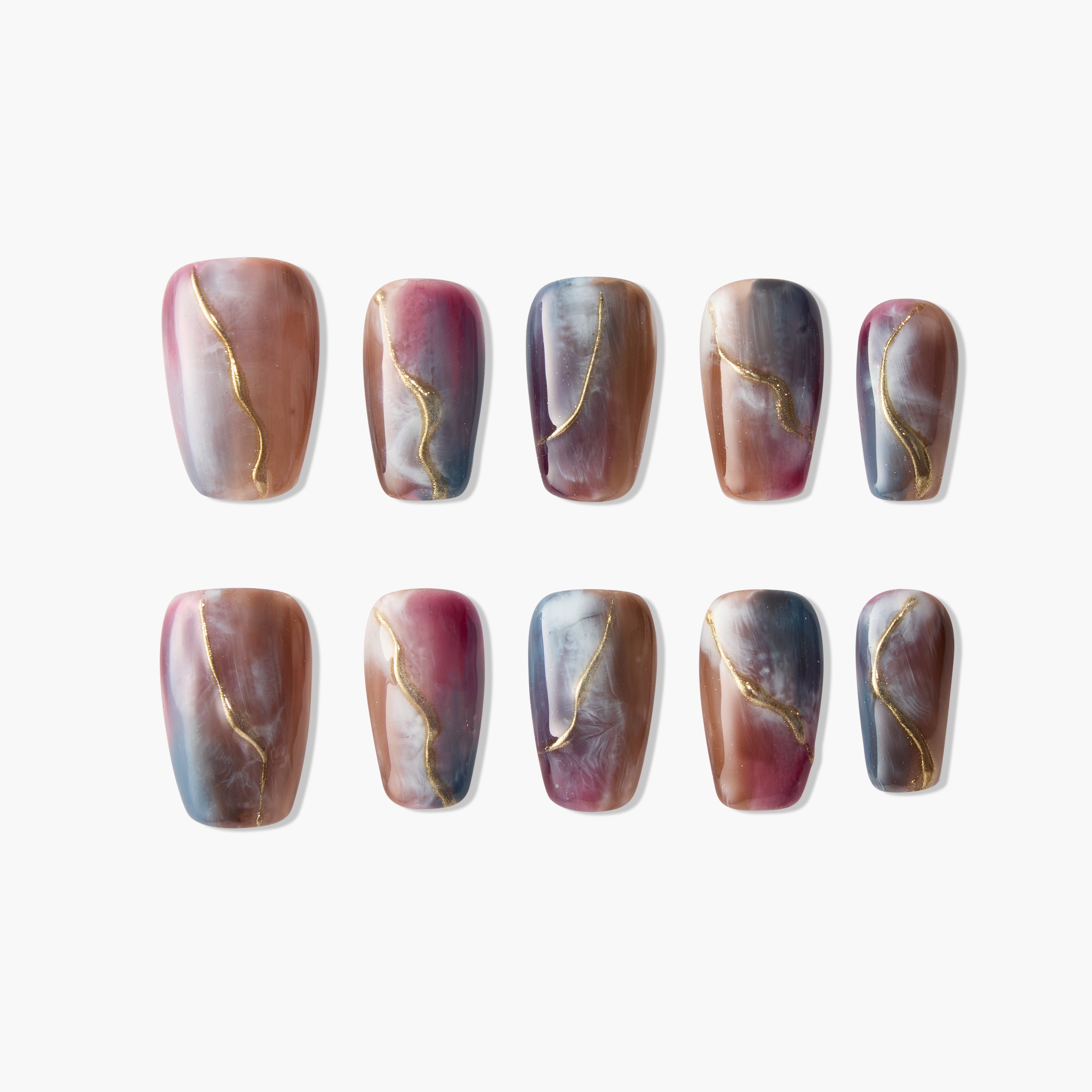 Handmade press-on nails with marble design in pink, brown, blue tones and gold accents