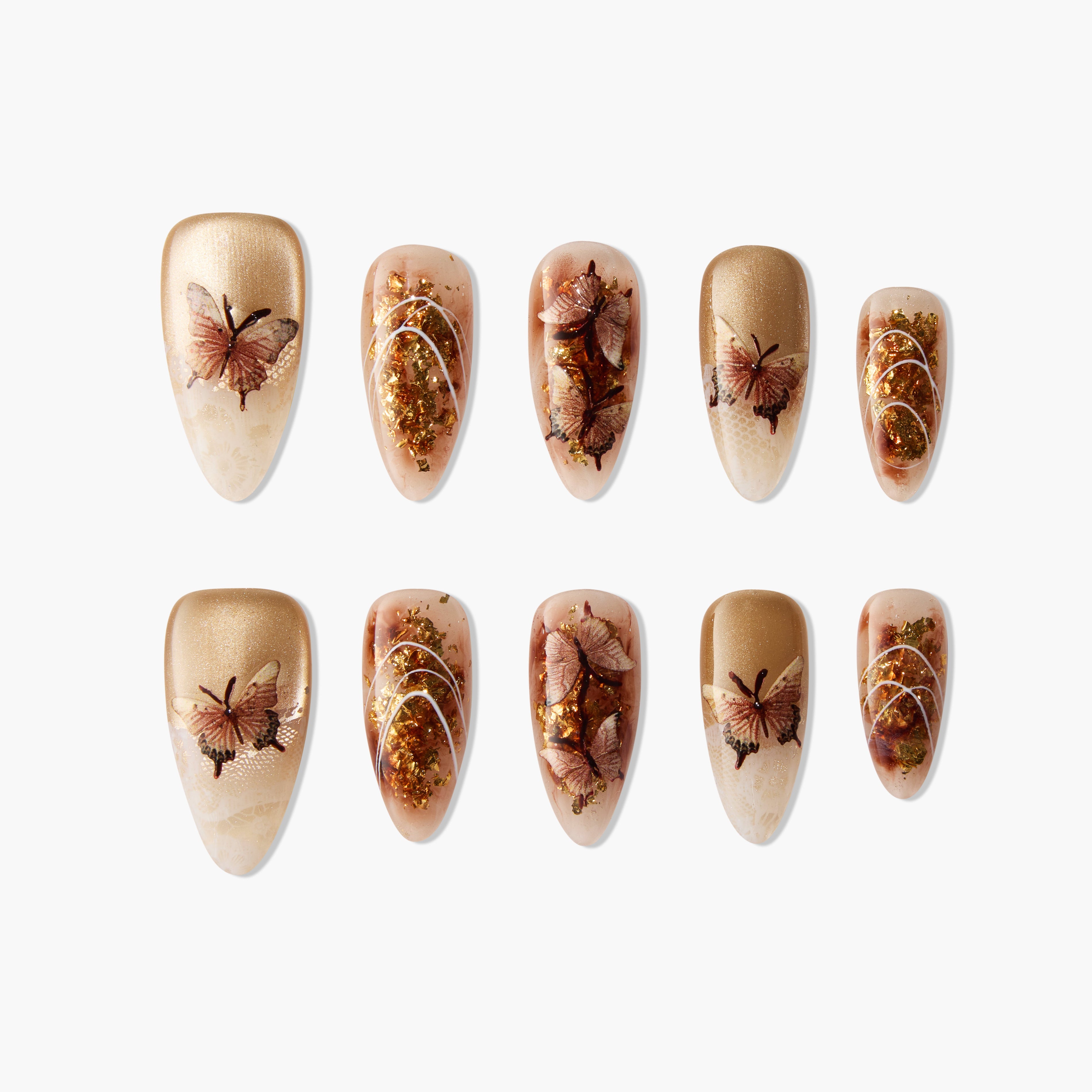 Handmade press-on nails with gold glitter, brown butterfly accents, and beige ombre design.