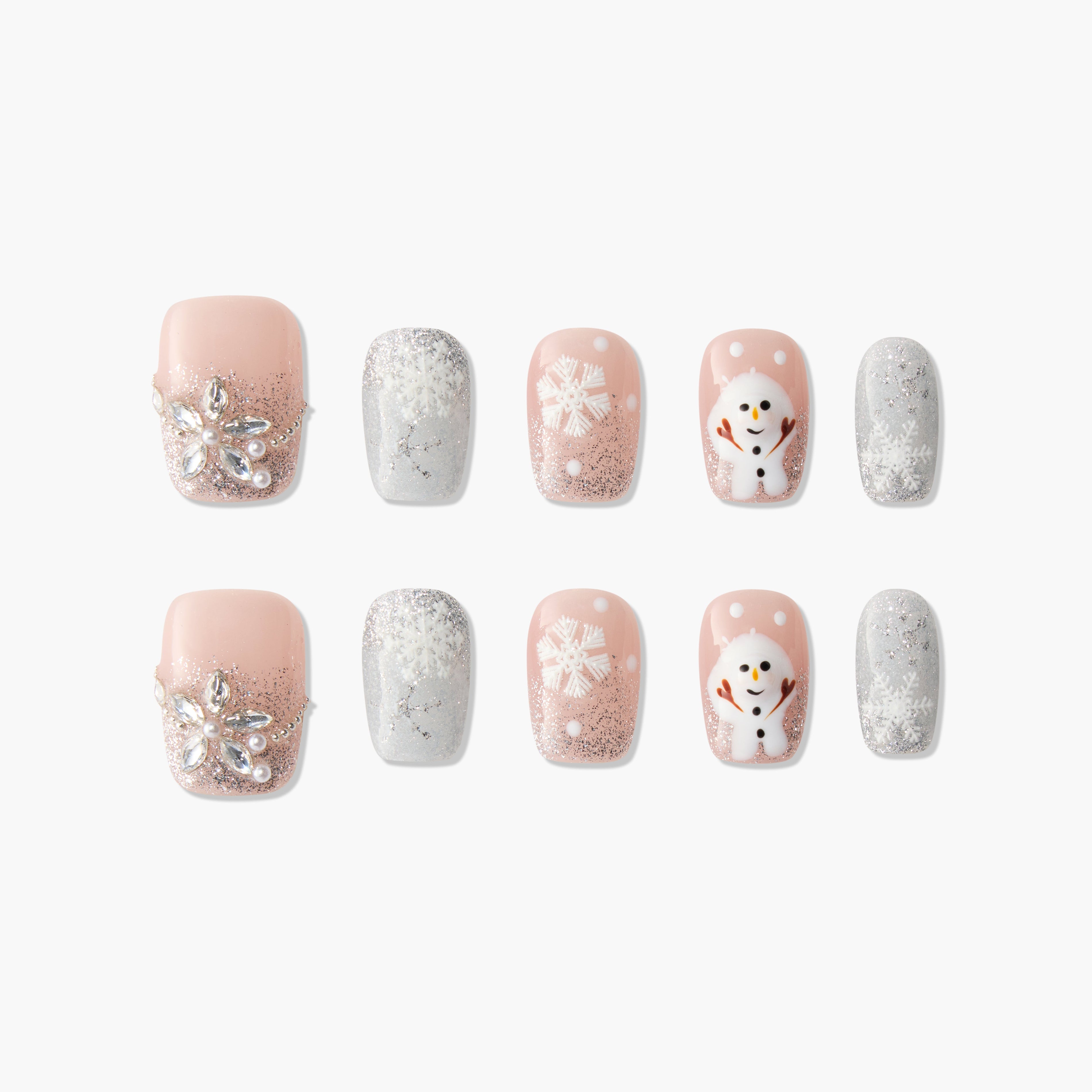 Handmade press-on nails with pink and silver glitter, snowflakes, gem accents, and snowman design