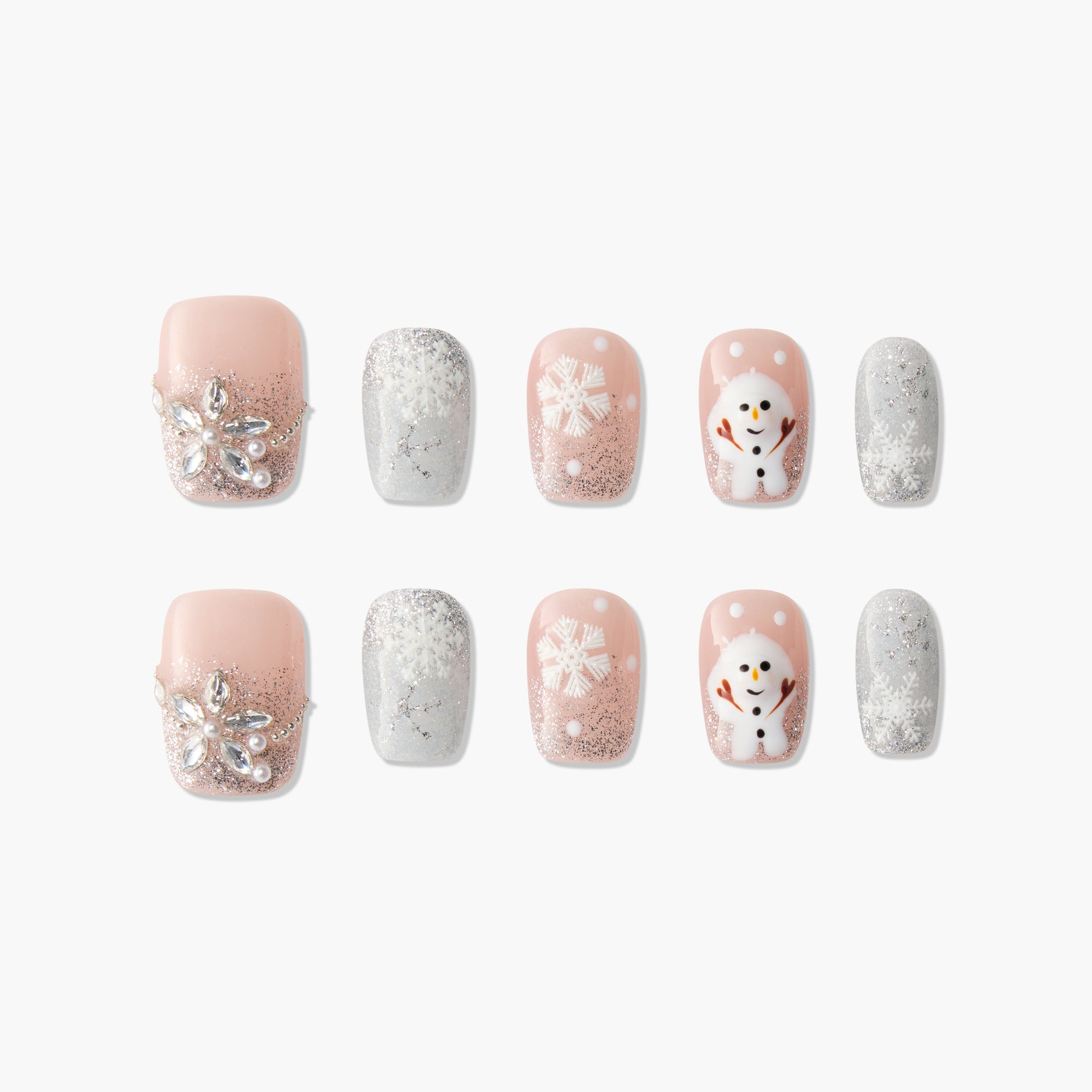 Handmade press-on nails with pink and silver glitter, snowflakes, gem accents, and snowman design