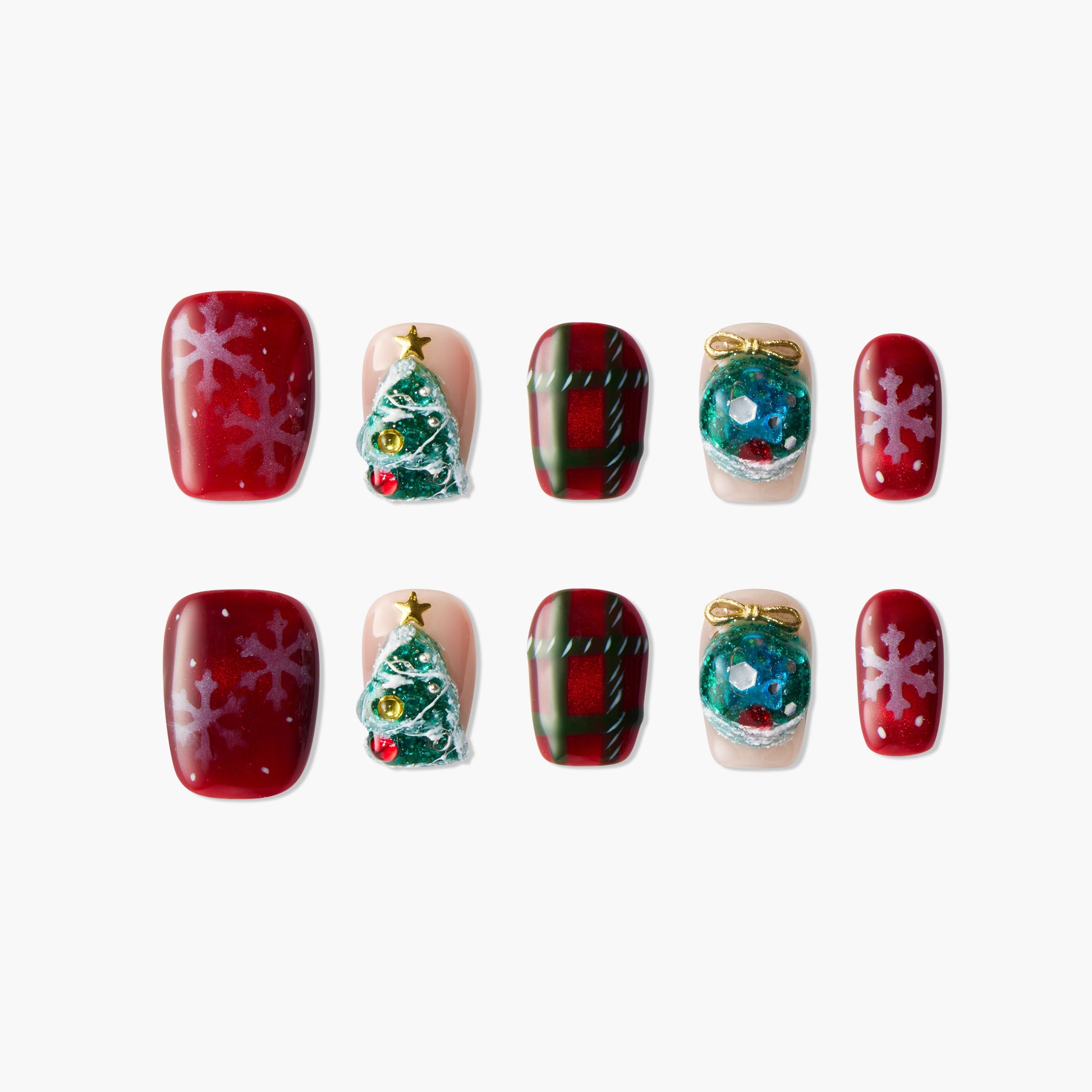 Handmade press-on nails with Christmas designs, including snowflakes, plaid, tree, and ornament arts.