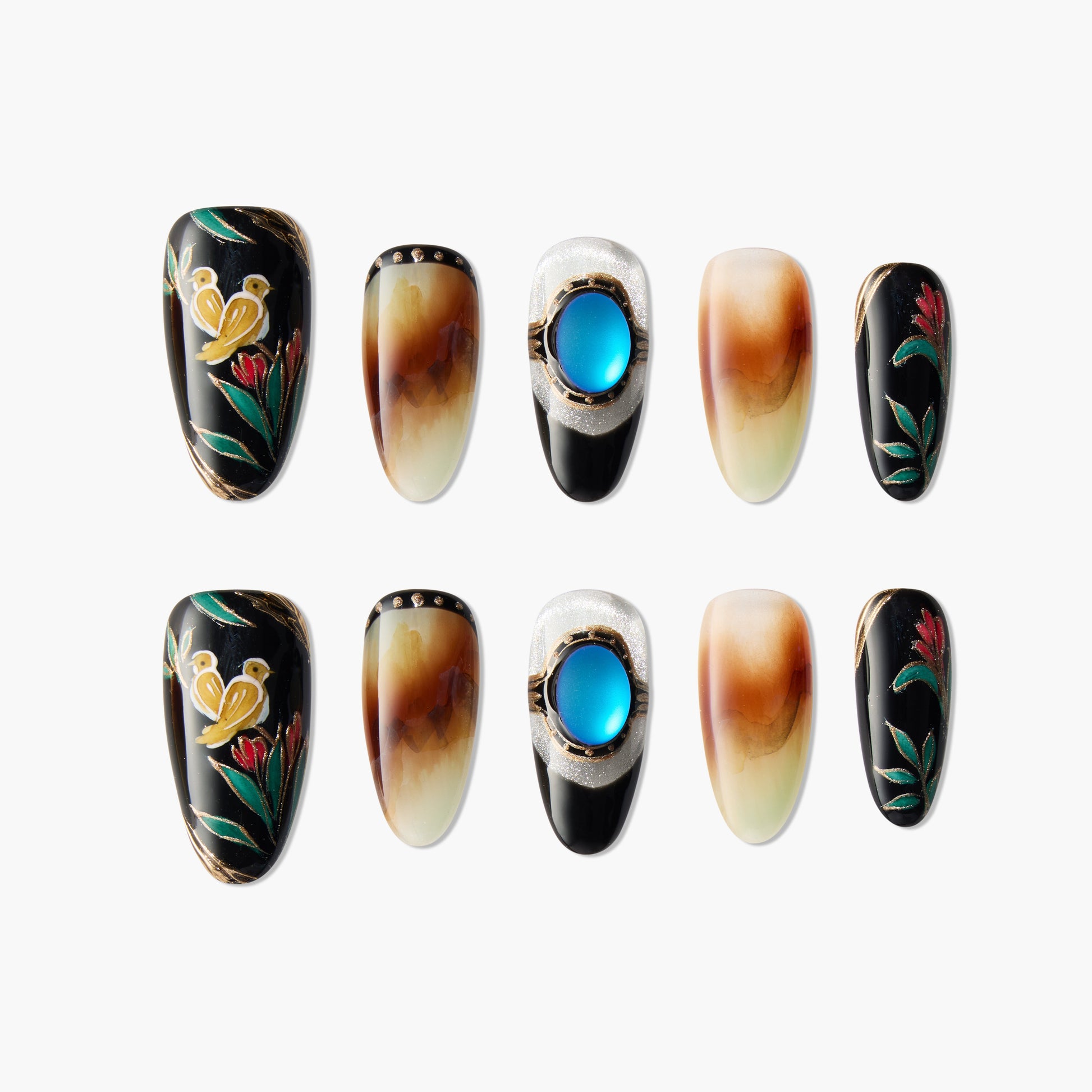 Handmade press-on nails with floral art, gemstone accents, and gradient brown designs