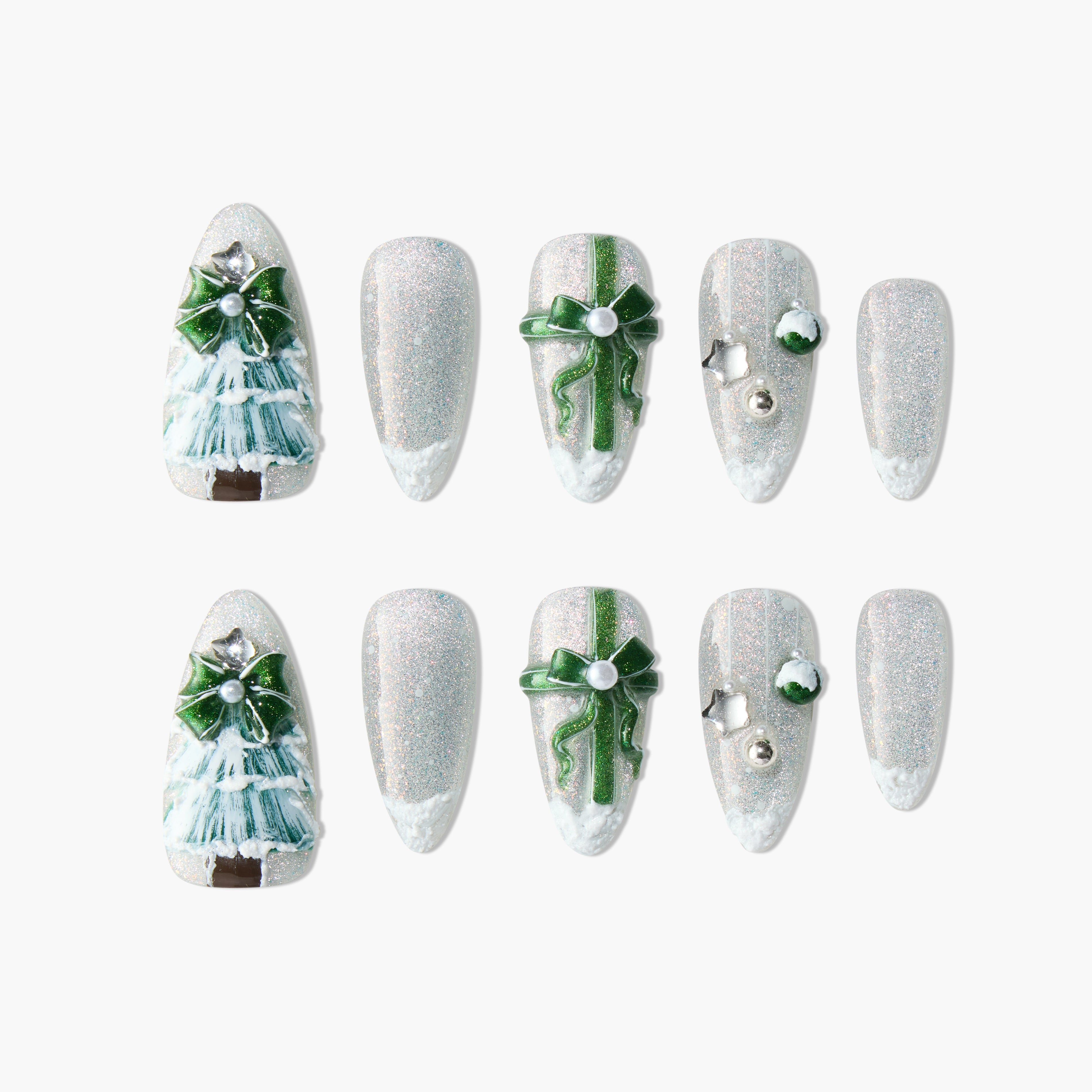 Handmade press-on nails with glitter, Christmas tree, green bows, and festive accents