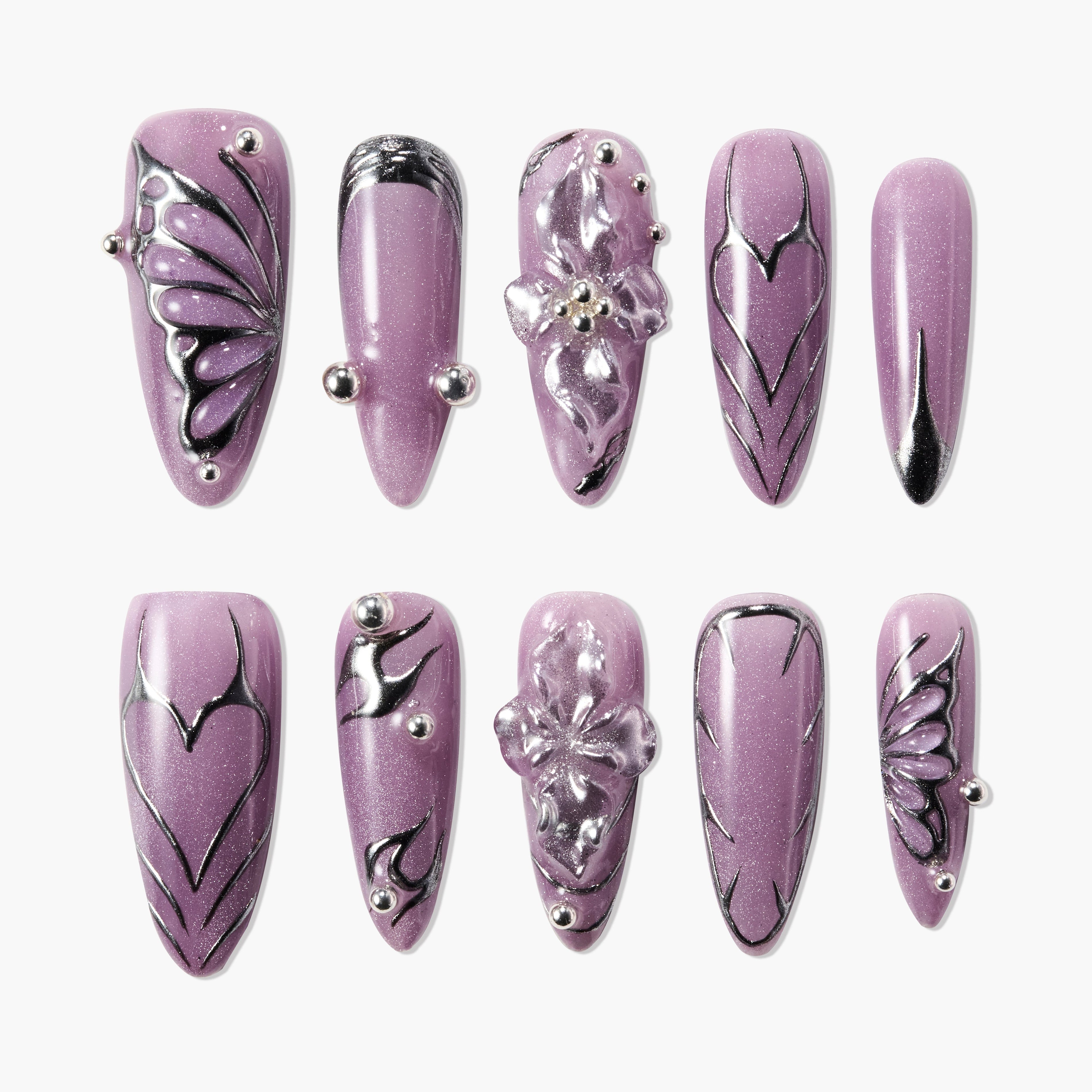 Set of purple press-on nails with metallic black floral and abstract designs, 3D accents, and rhinestones