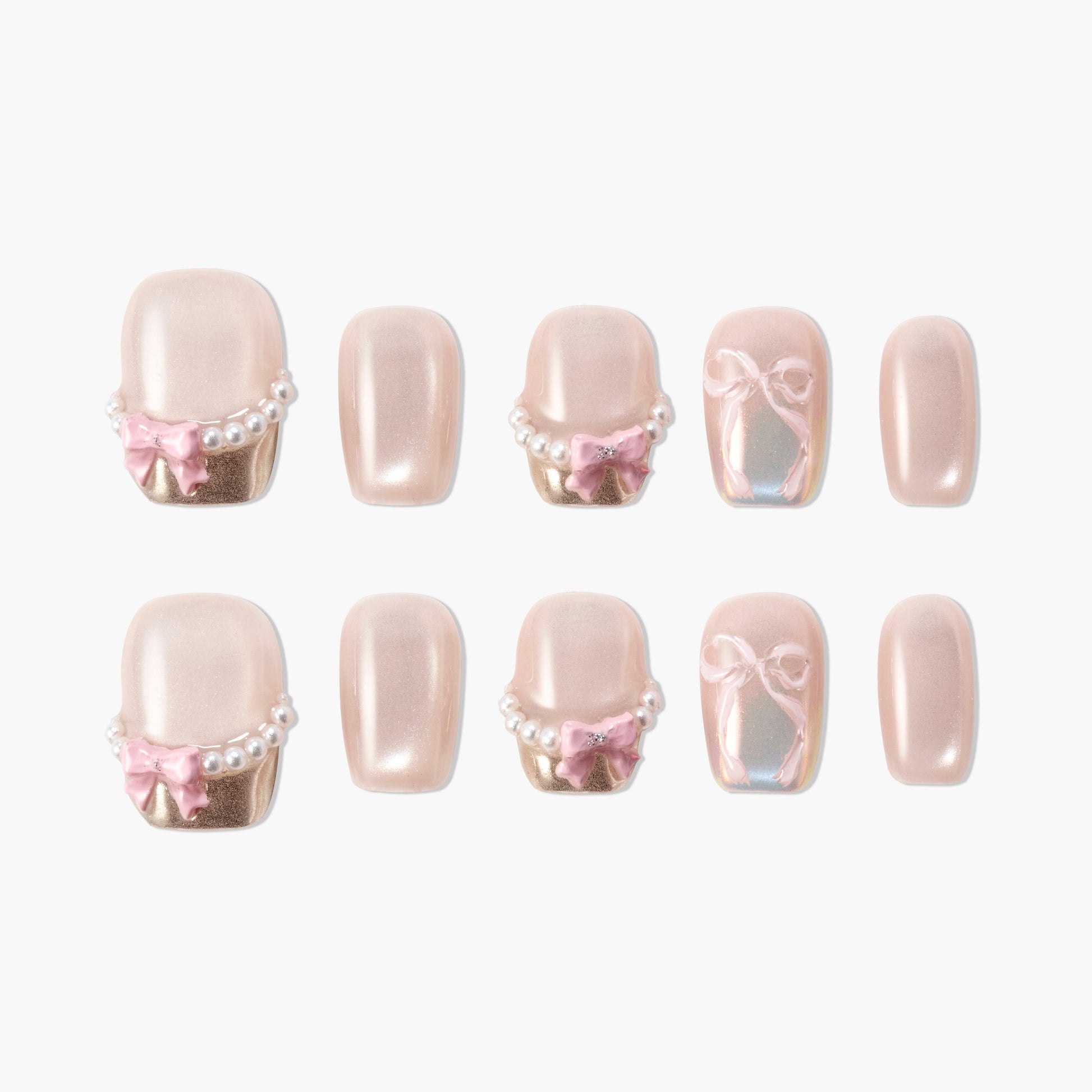 Handmade pink press-on nails with pearl accents, gold tips, and 3D pink bow designs