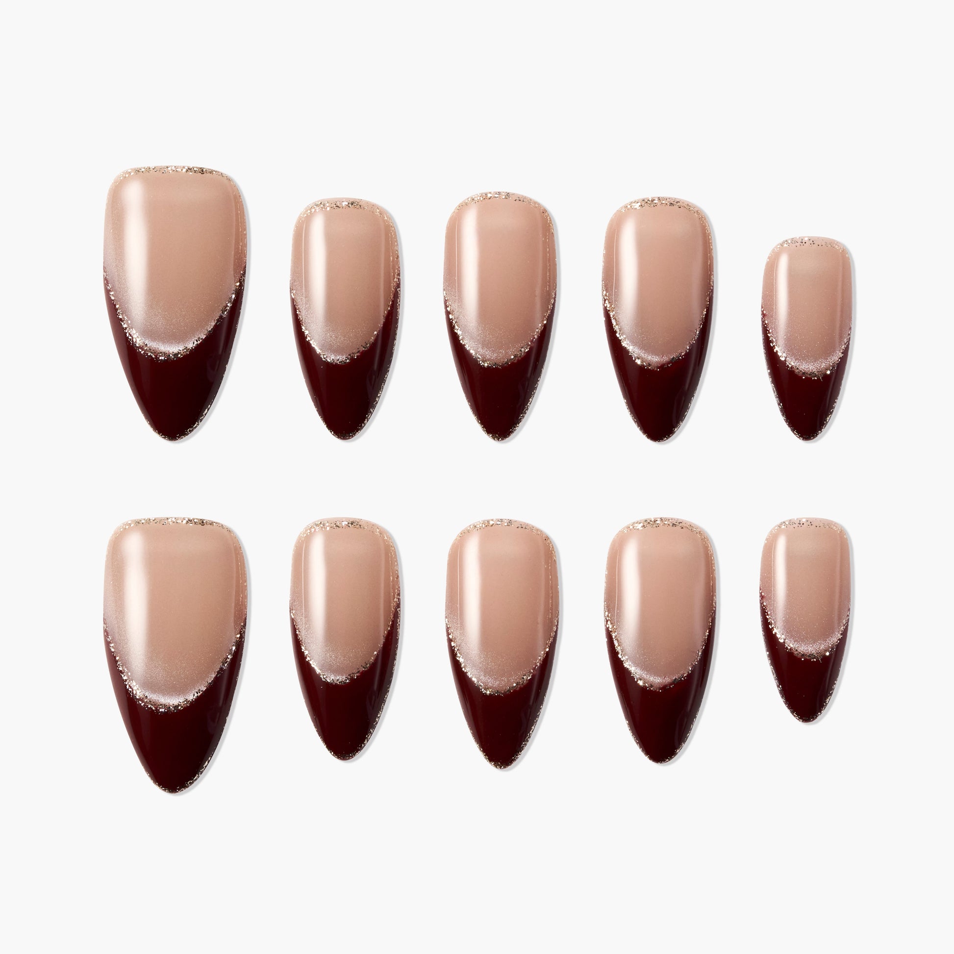 Handmade press-on nails with nude base, burgundy French tips, and subtle glitter accents