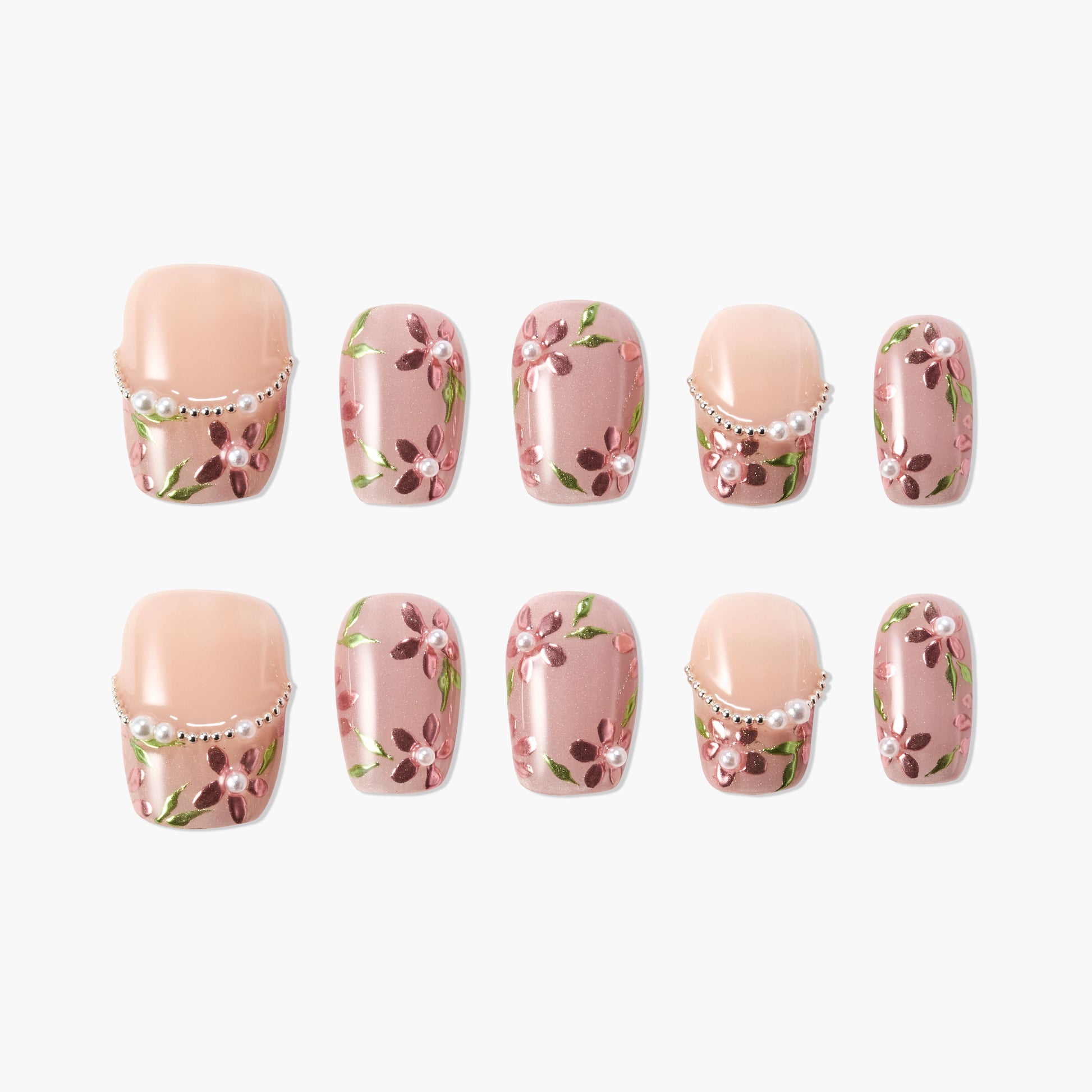 Handmade press-on nails with pink floral design, green leaves, and pearl accents