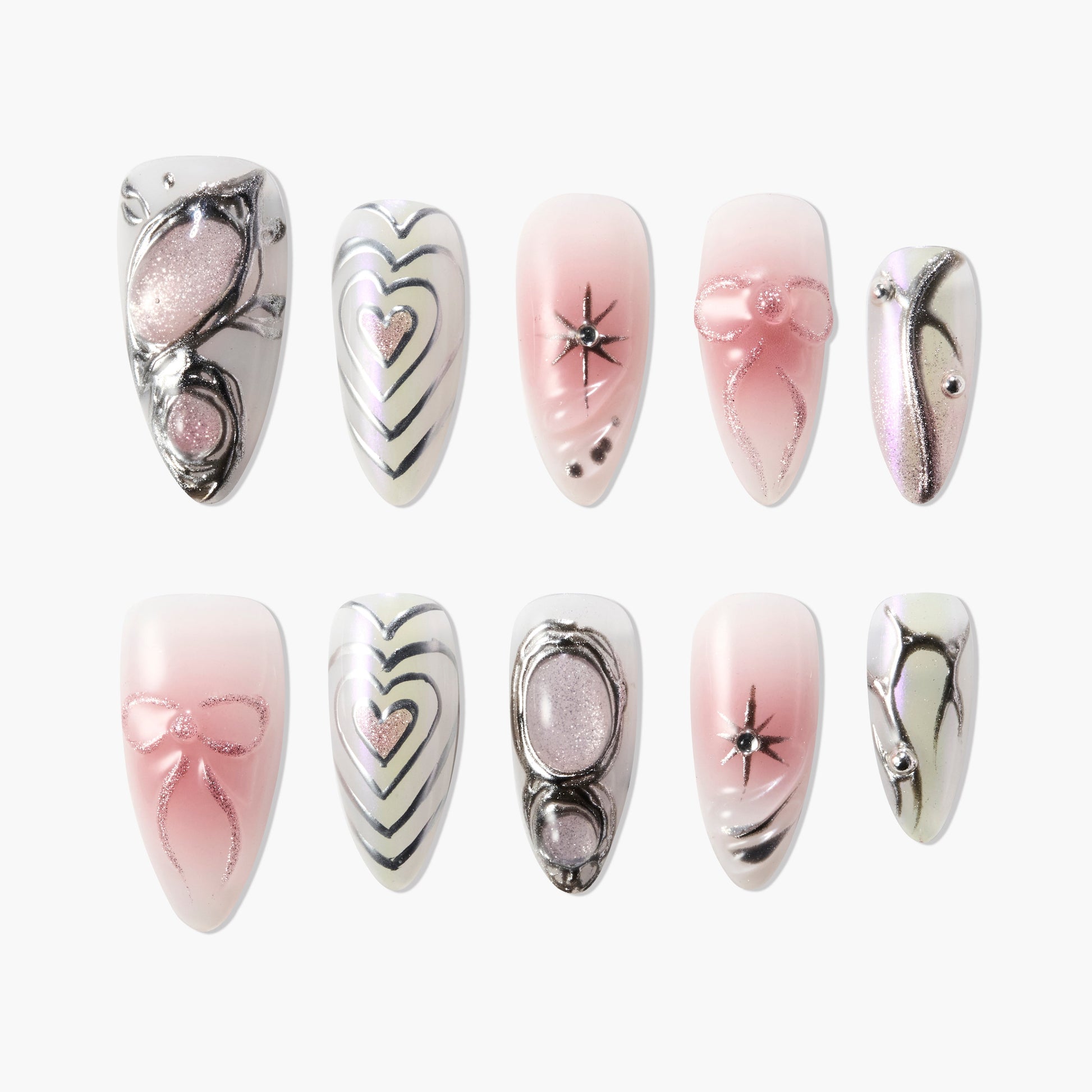 Handmade pink and silver press-on nails with hearts, bows, rhinestones, and abstract designs