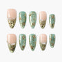 Green and gold floral press-on nails with gold accents and pearl embellishments