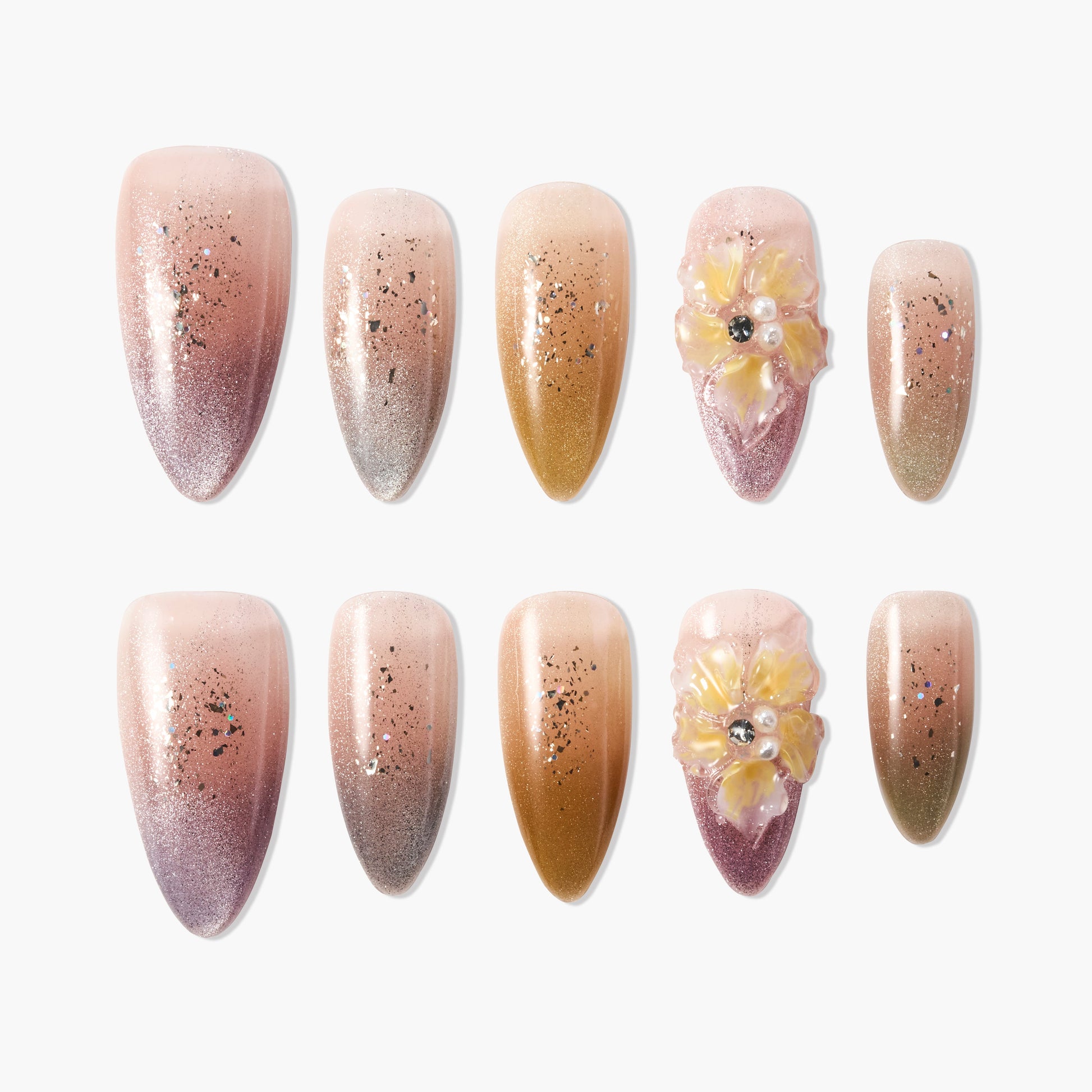Handmade press-on nails with gradient glitter design and 3D floral accent, elegant almond shape