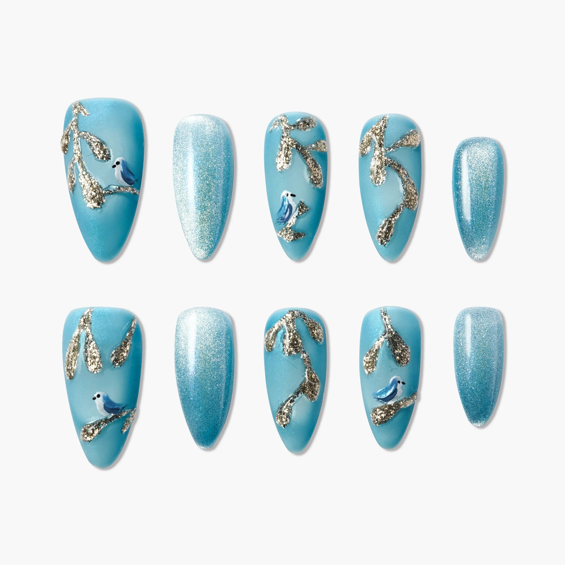 Blue press-on nails with glitter branches and small bird designs, elegant and reusable.