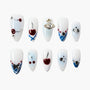 Handmade press-on nails with cherry designs, blue accents, and rhinestone embellishments.