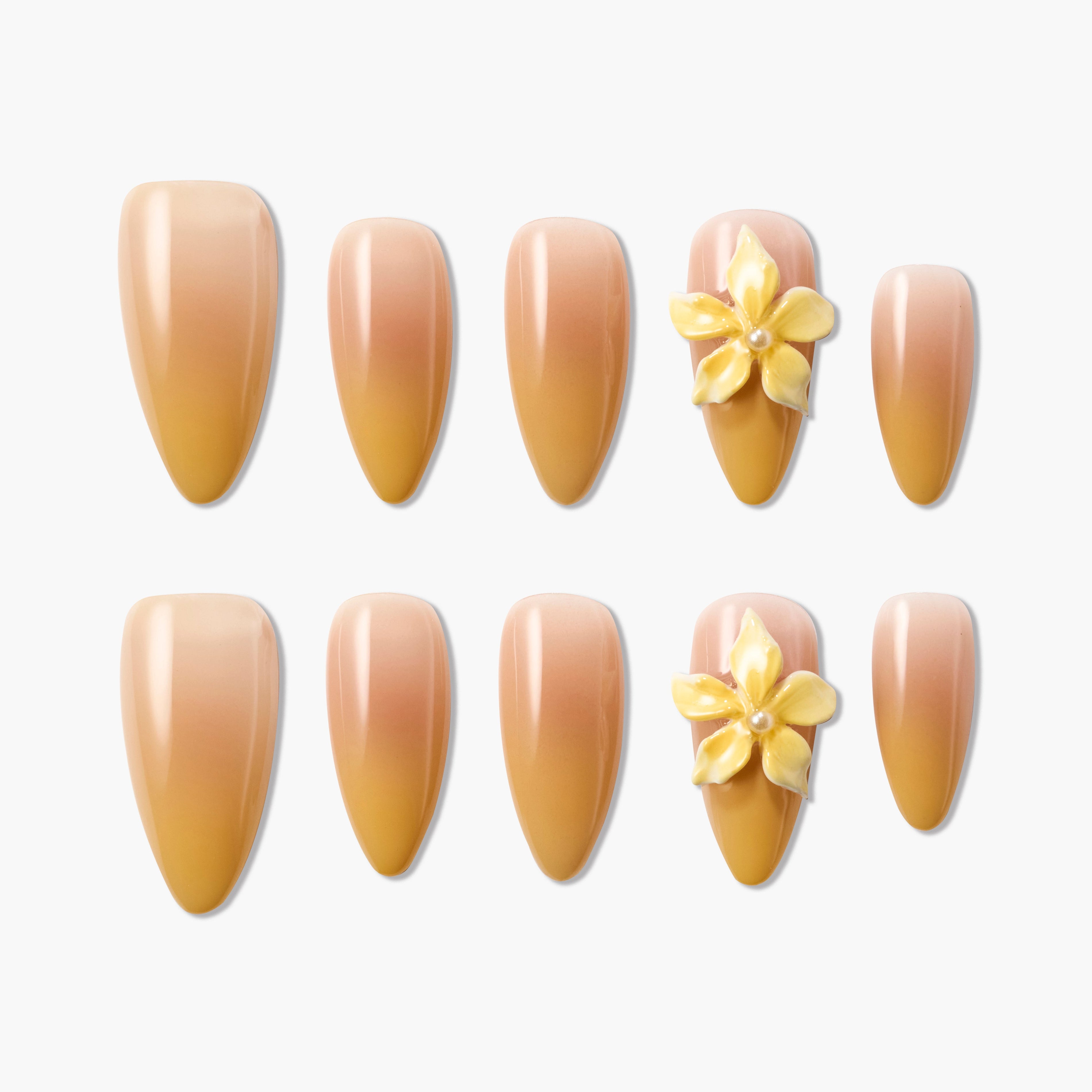 Ombre yellow nude press-on nails with 3D yellow flower accents, glossy finish