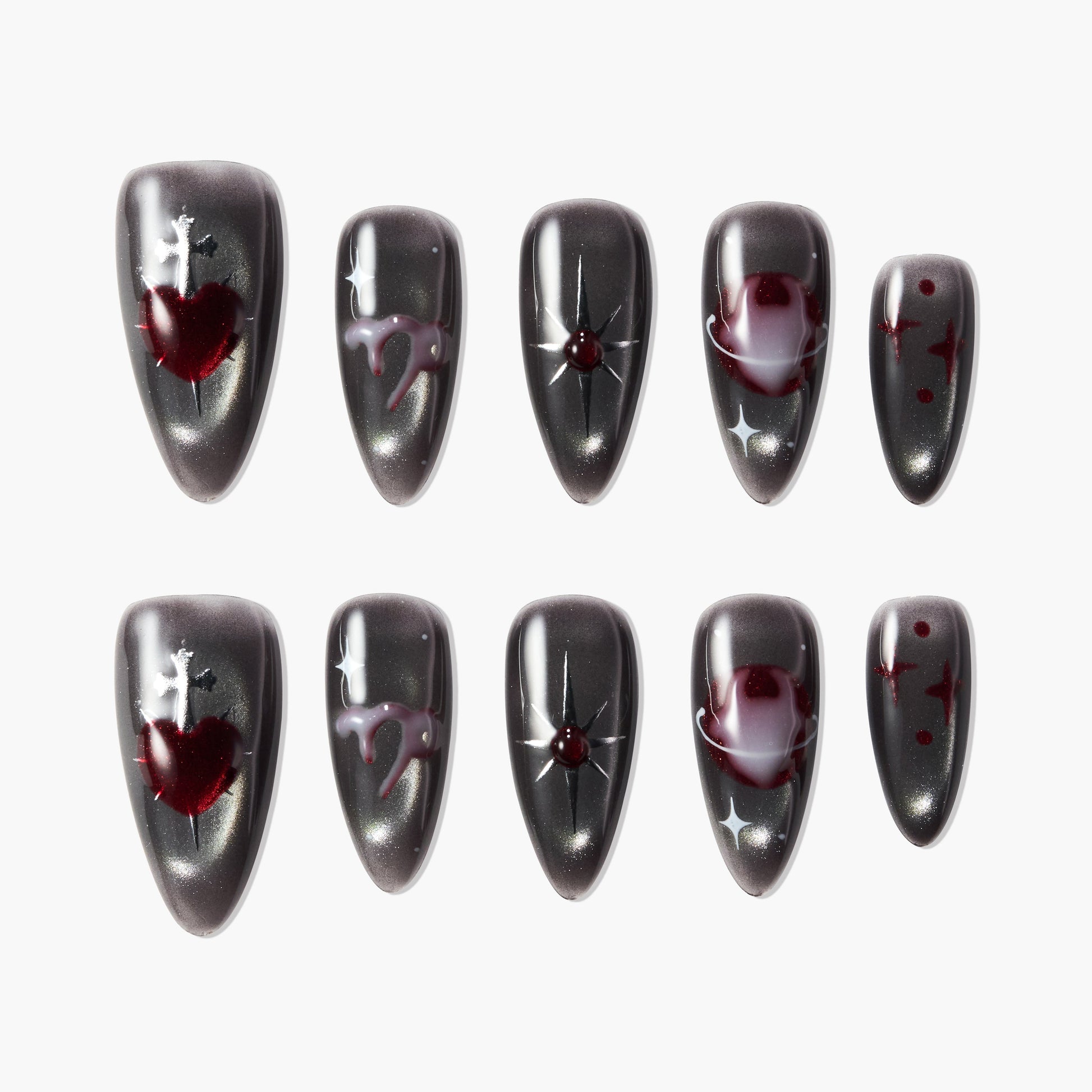 Handmade black press-on nails with red heart, star, and swirl designs, glossy finish