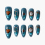 Blue glitter press-on nails with brown celestial and heart designs, set of ten.