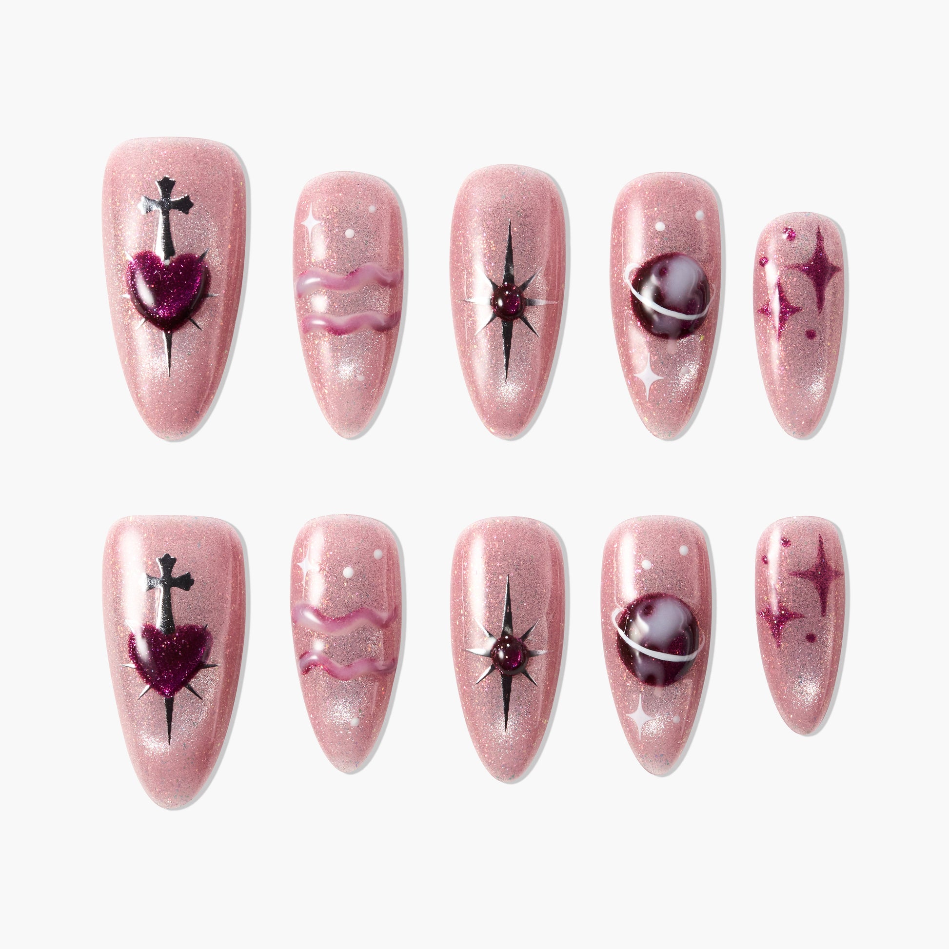 Set of pink glitter press-on nails with heart, star, and planet designs, ideal for nail art