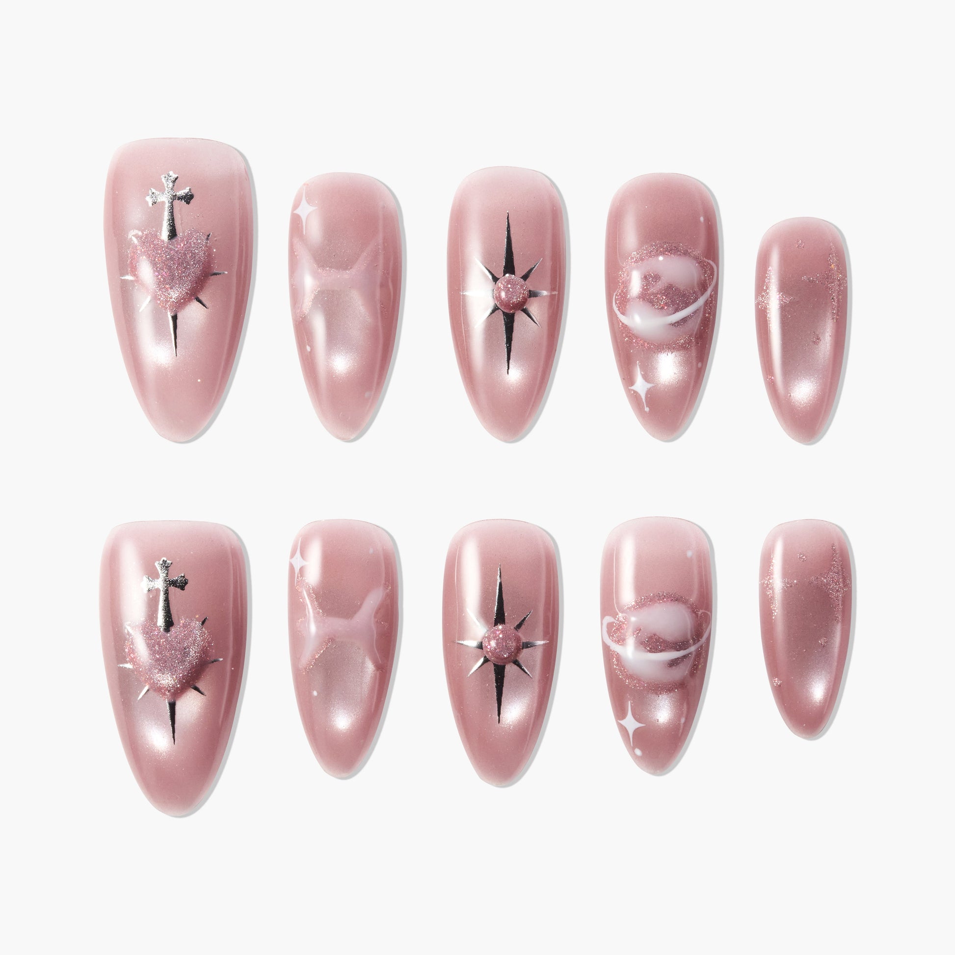 Pink handmade press-on nails with celestial, heart, and star designs, glossy finish