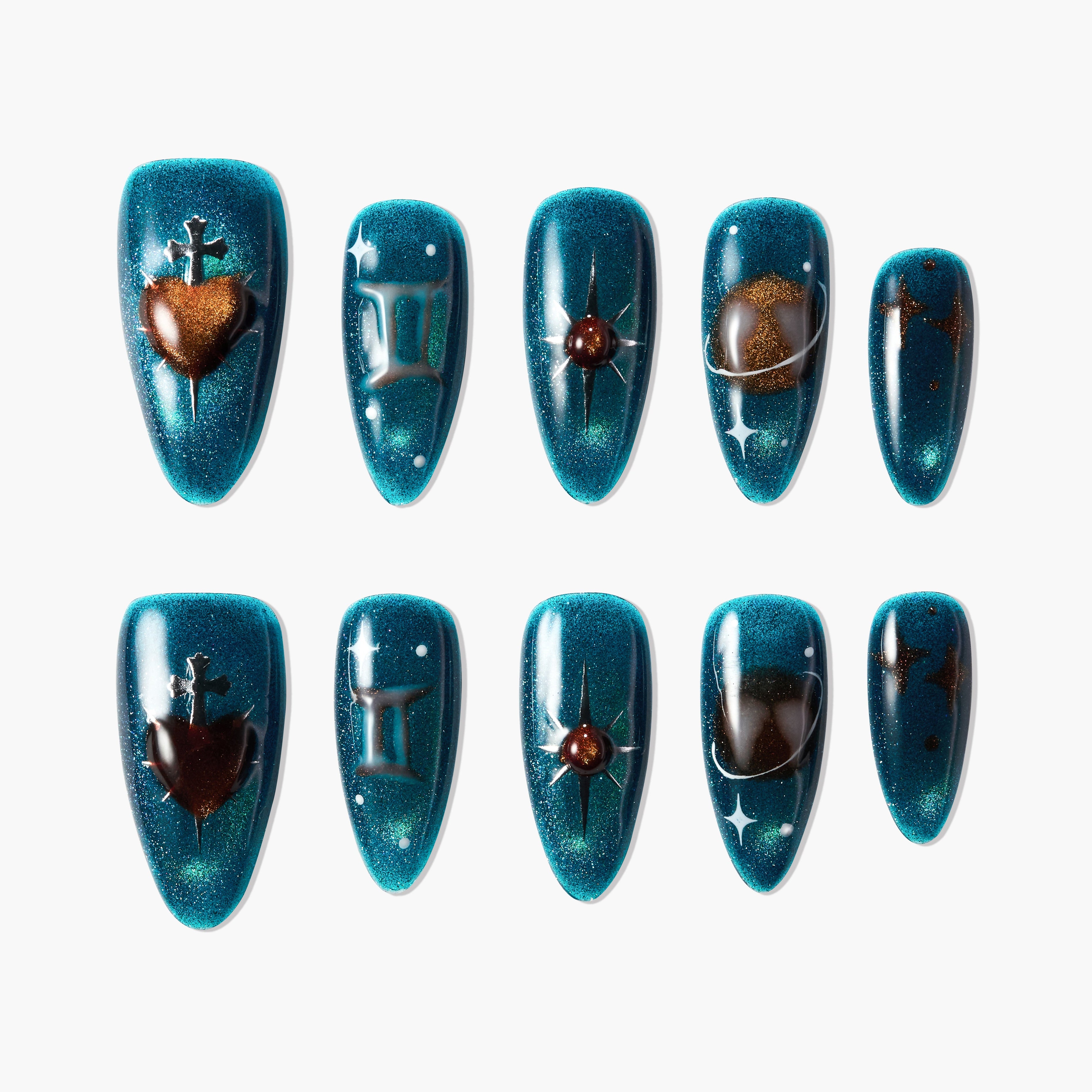 Set of blue glitter press-on nails with celestial and heart designs, featuring metallic accents.