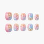 Handmade press-on nails with pastel ombre and gold star designs, reusable and salon-quality