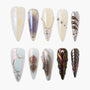 Handmade press-on nails with metallic, pearl, and 3D designs in assorted styles