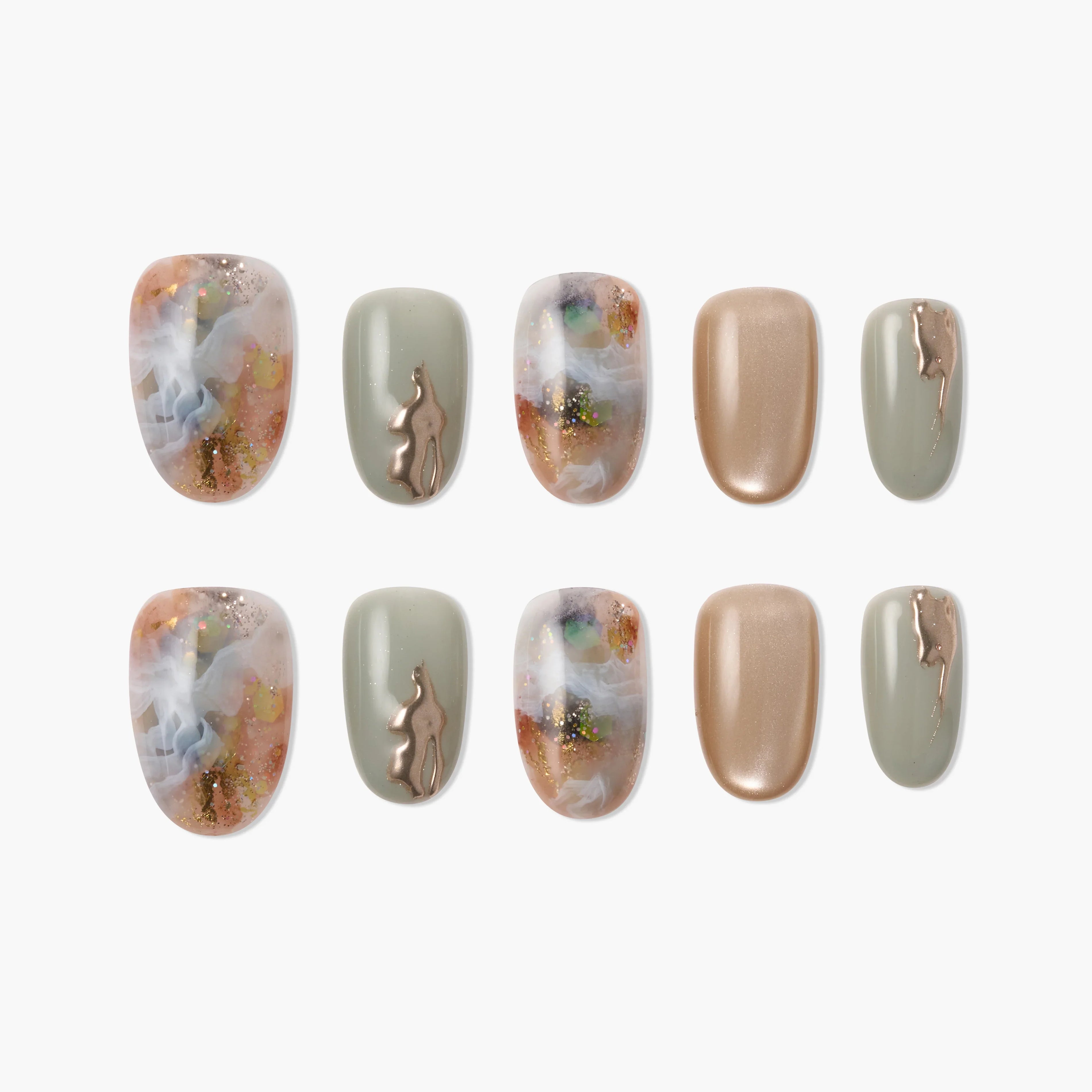 Handmade press-on nails with marble patterns, sage green, gold metallic accents, and artistic designs