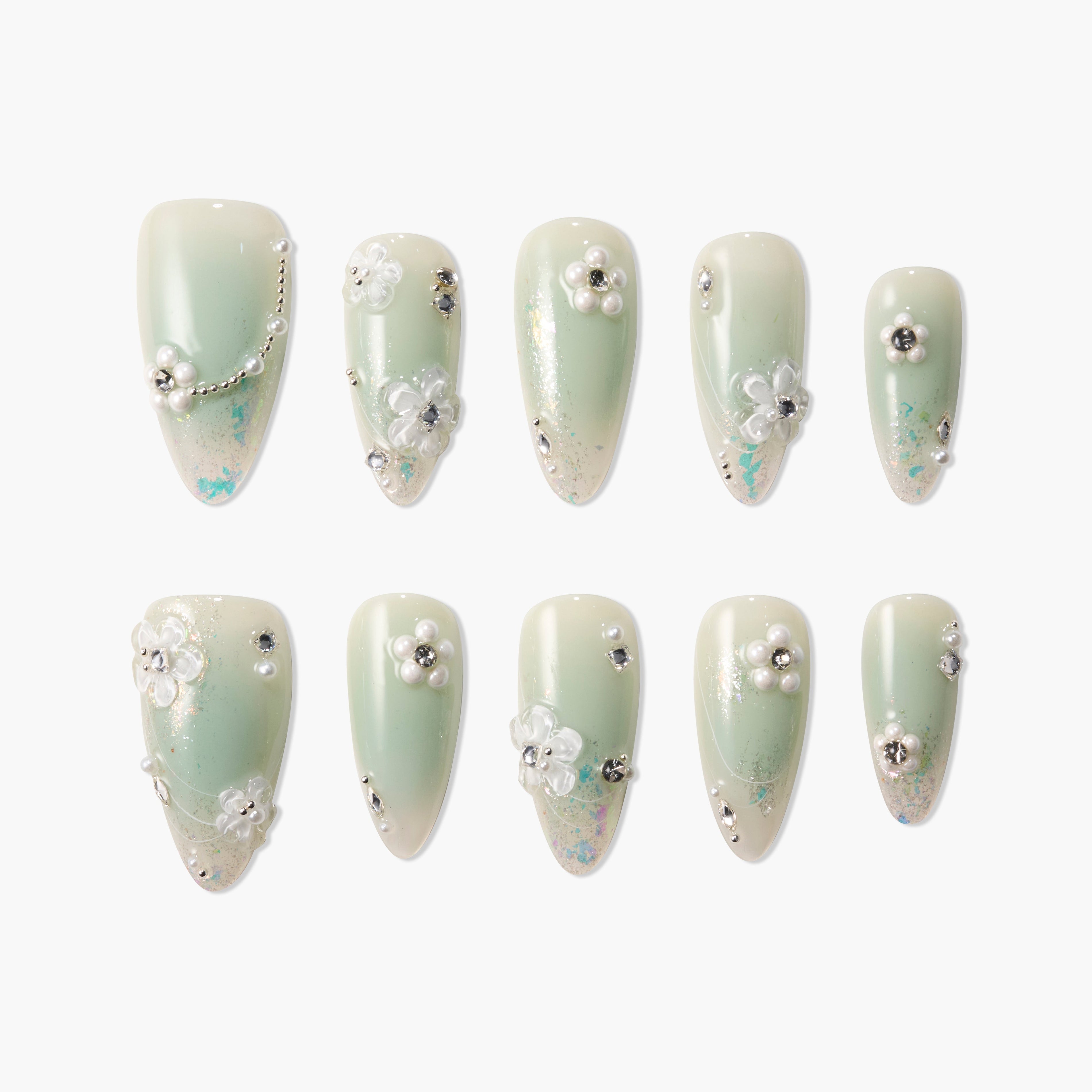 Handmade green press-on nails with pearl, floral, and rhinestone 3D embellishments