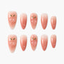 Peach design nude press-on nails with glossy finish and ombré gradient pattern