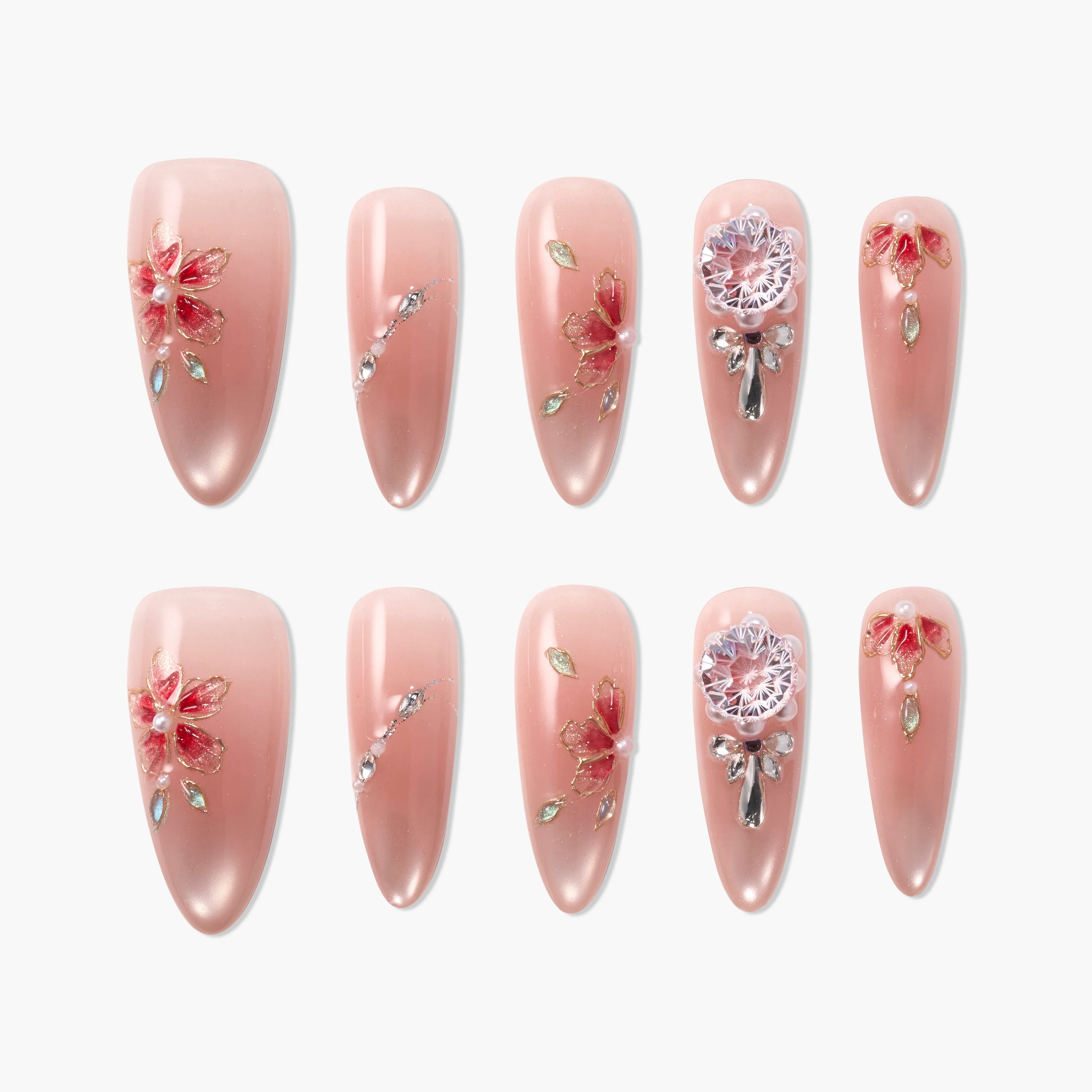 Handmade pink press-on nails with 3D floral designs, rhinestones, and jeweled accents