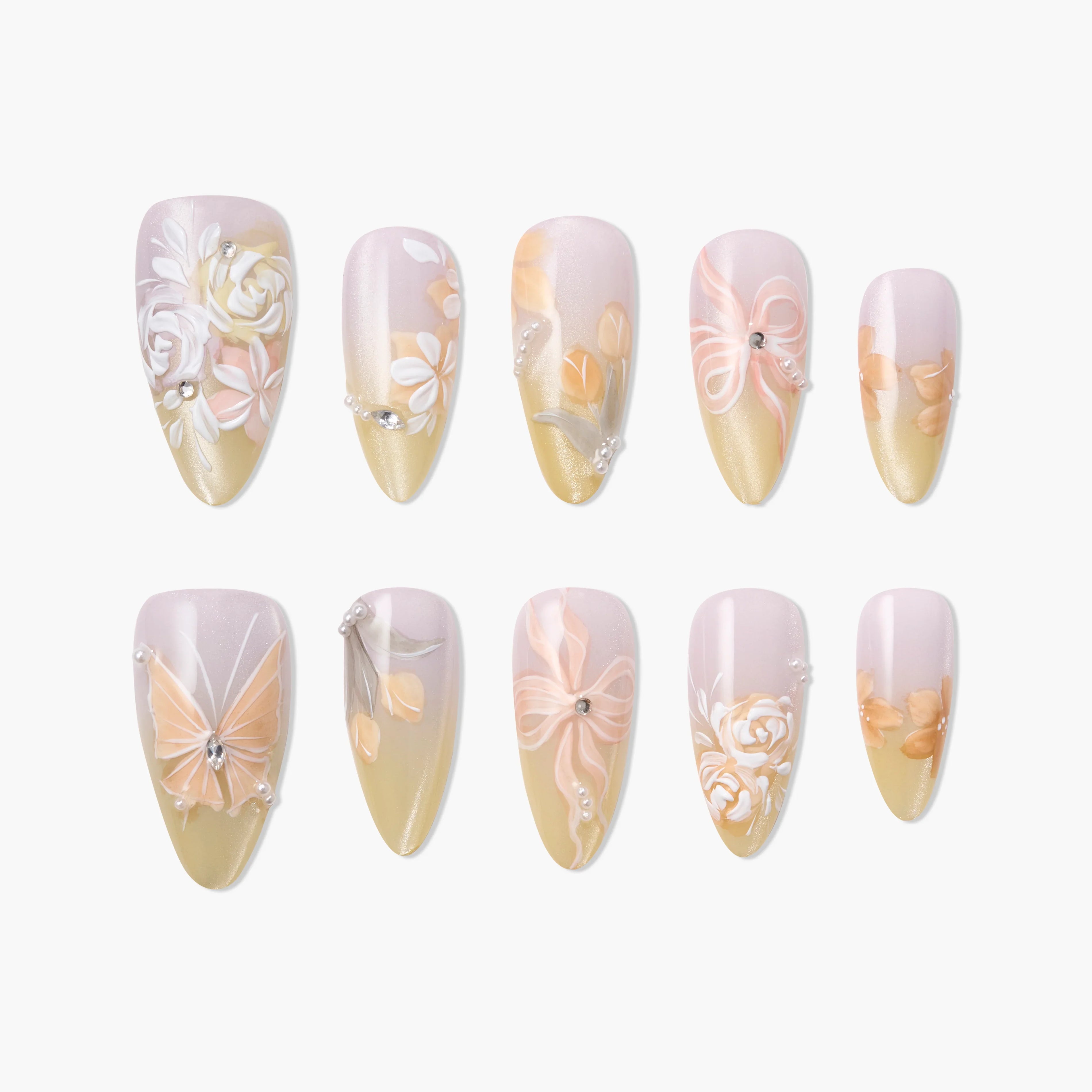 Handmade floral press-on nails with peach and gold gradient, 3D flowers, pearl and gem accents