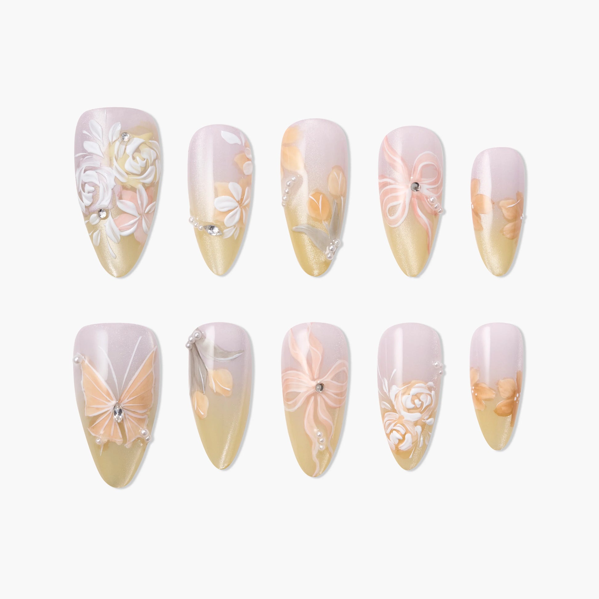 Handmade floral press-on nails with peach and gold gradient, 3D flowers, pearl and gem accents