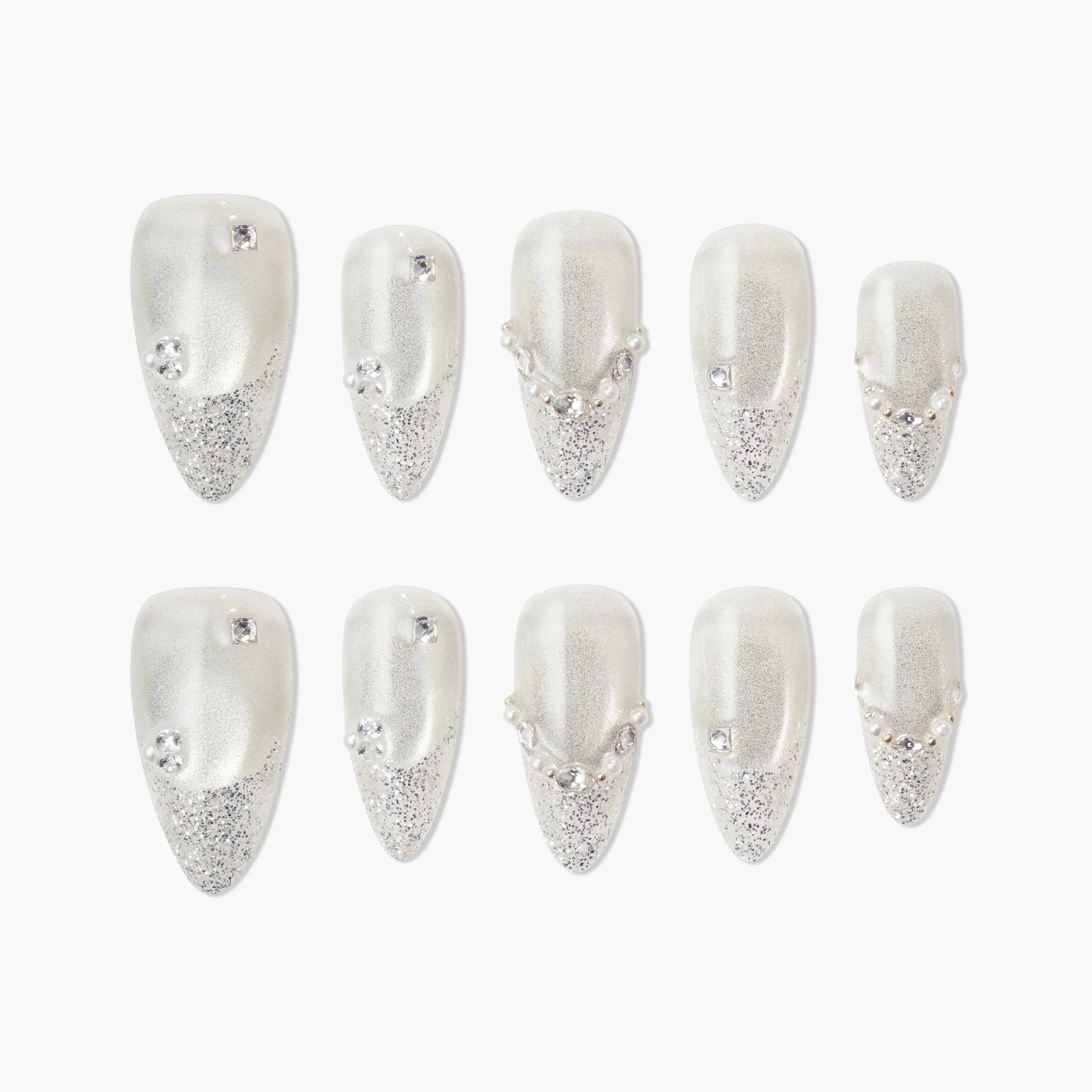 Handmade press-on nails with silver glitter tips, rhinestones, and pearl accents, elegant design