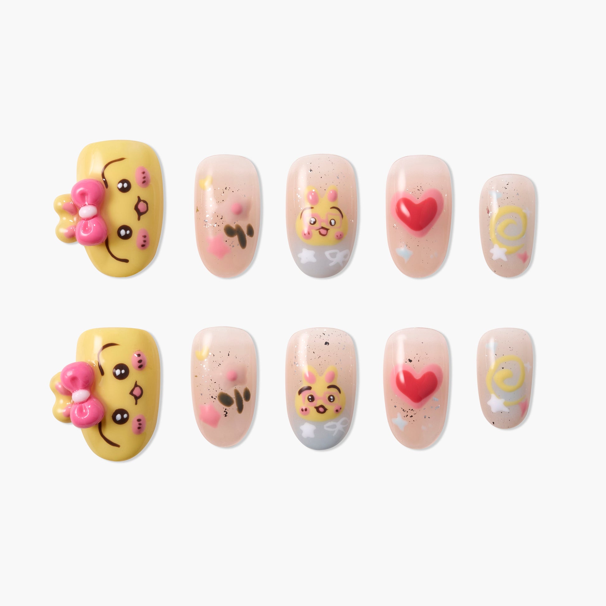 Cute press-on nails with 3D cartoon faces, hearts, and swirl designs on nude base
