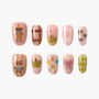 Handmade press-on nails with cute bear, bow, plaid, and gem designs on pink backgrounds.