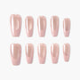 Set of glossy pink nude press-on nails with a subtle pearl shimmer, arranged on white background