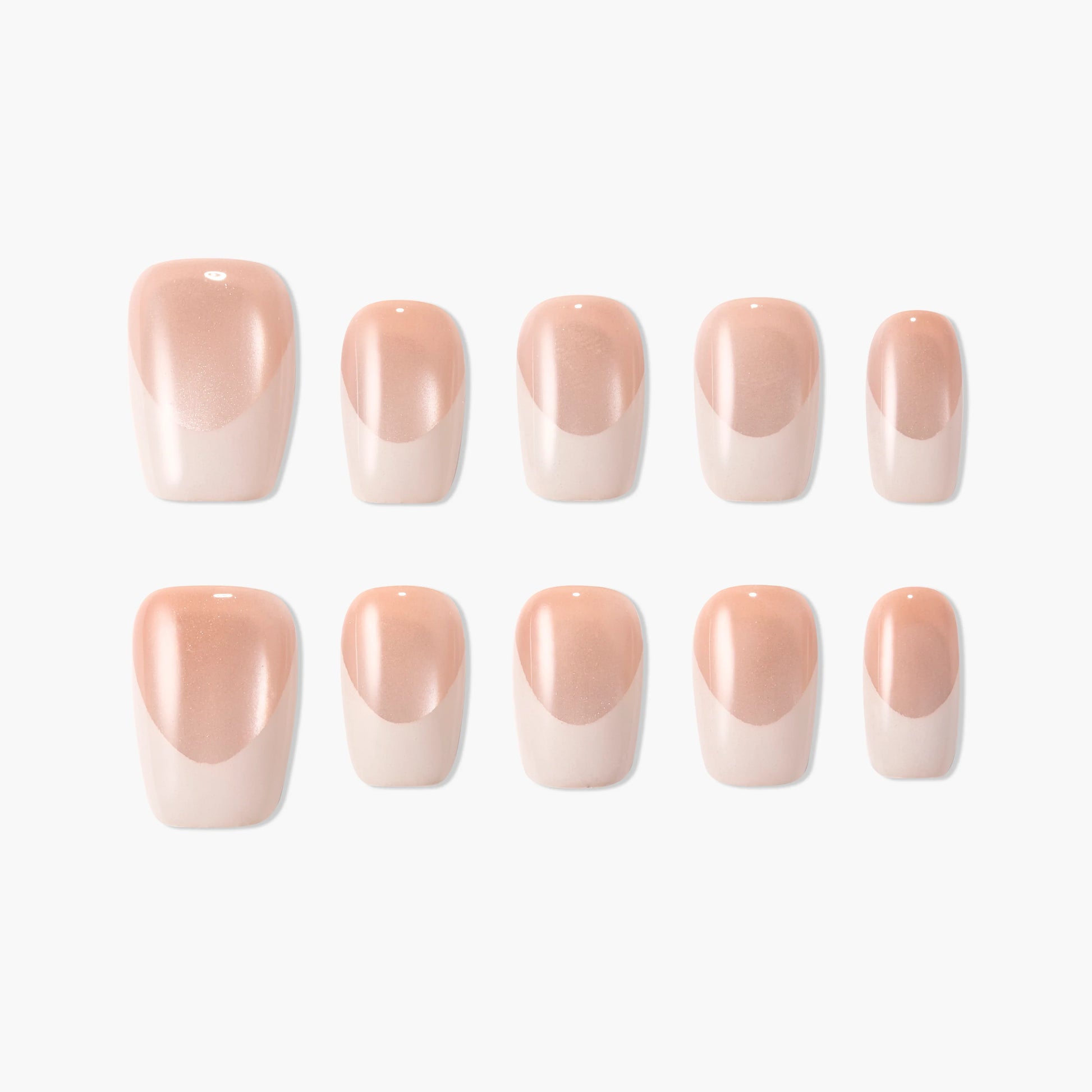 Set of nude and pink French tip press-on nails, glossy finish, arranged on white background
