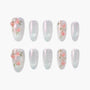 Handmade press-on nails with pearl shimmer and 3D pink floral design, set of ten