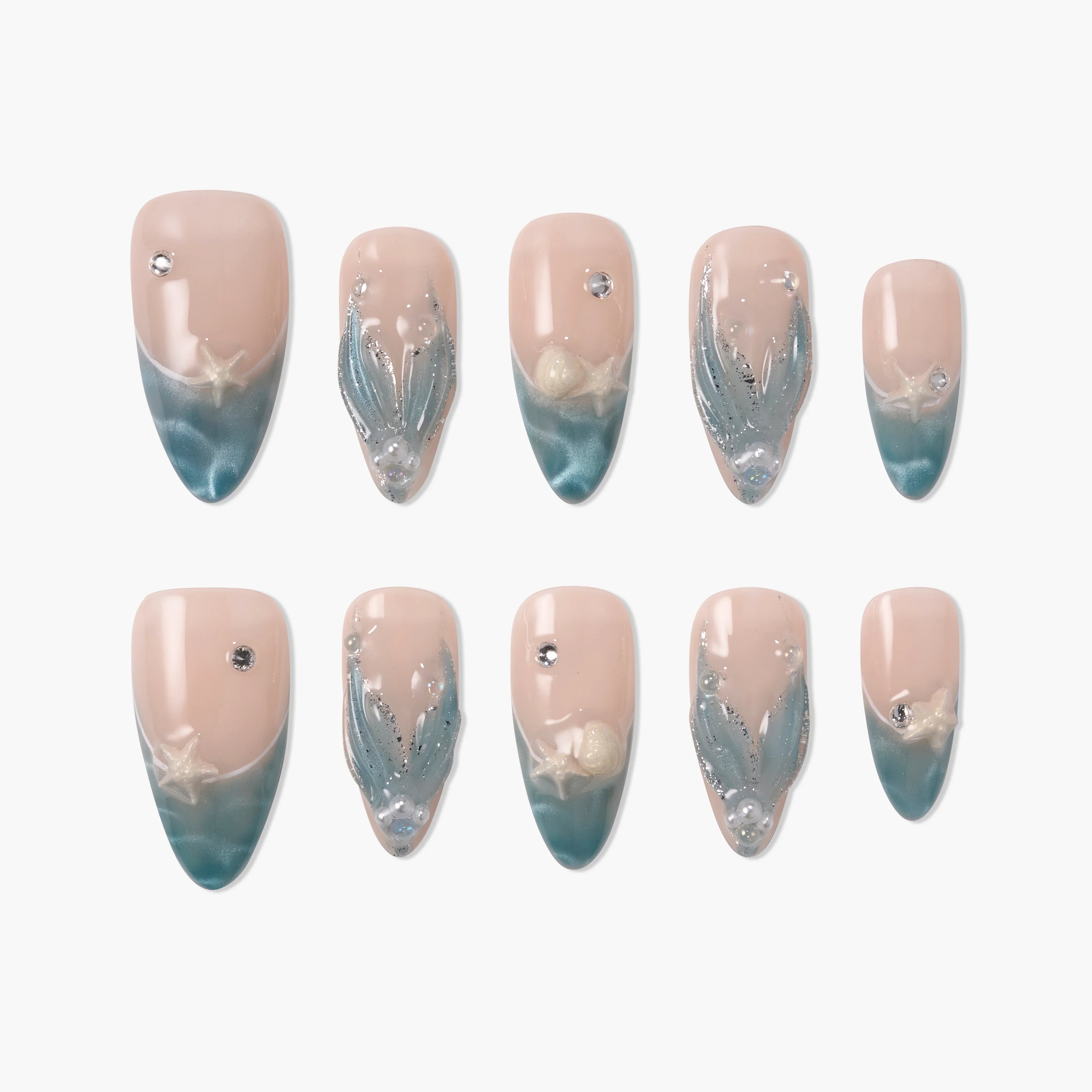 Blue and nude press-on nails with seashell and pearl accents, ocean-inspired nail design