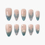 Blue and nude press-on nails with seashell and pearl accents, ocean-inspired nail design