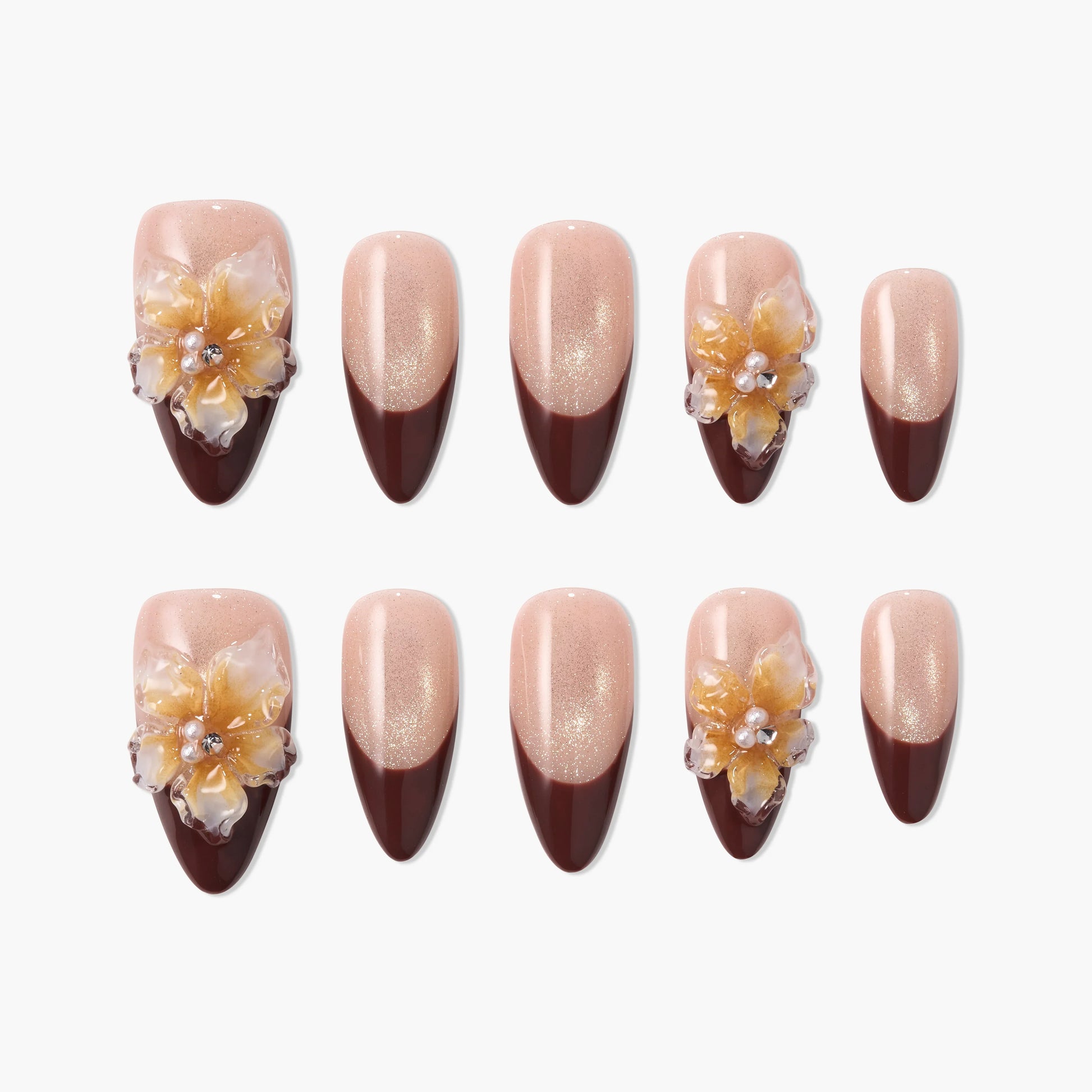 Glitter nude and brown French press-on nails with 3D yellow floral accents and rhinestones