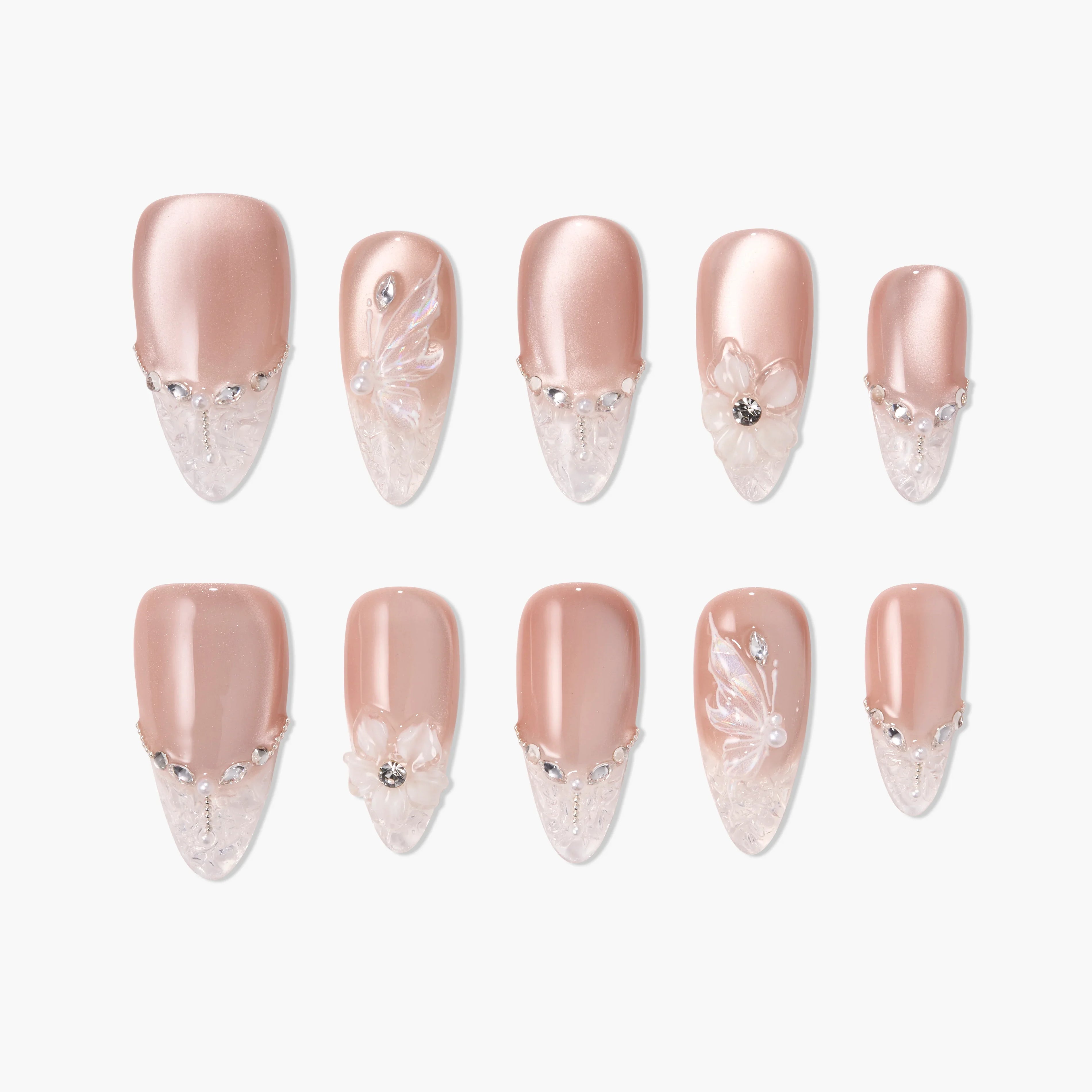 Handmade press-on nails in blush pink with crystal accents and 3D floral designs