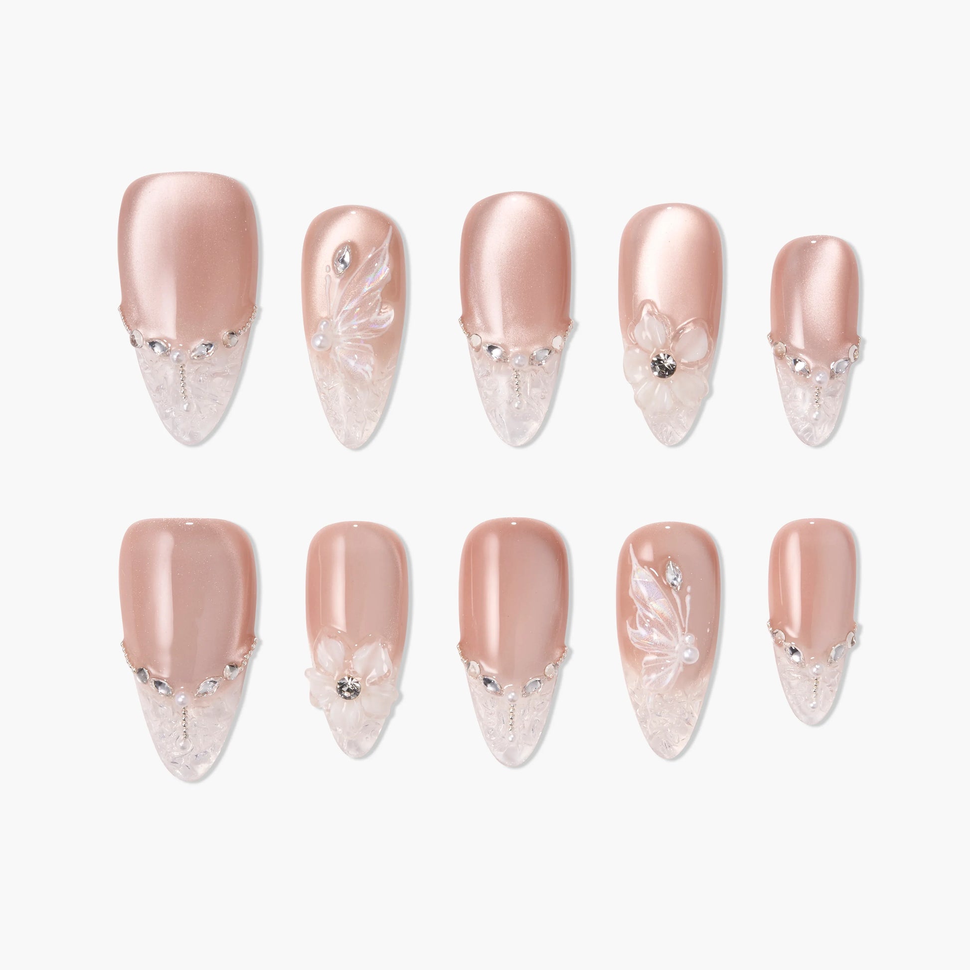 Handmade press-on nails in blush pink with crystal accents and 3D floral designs