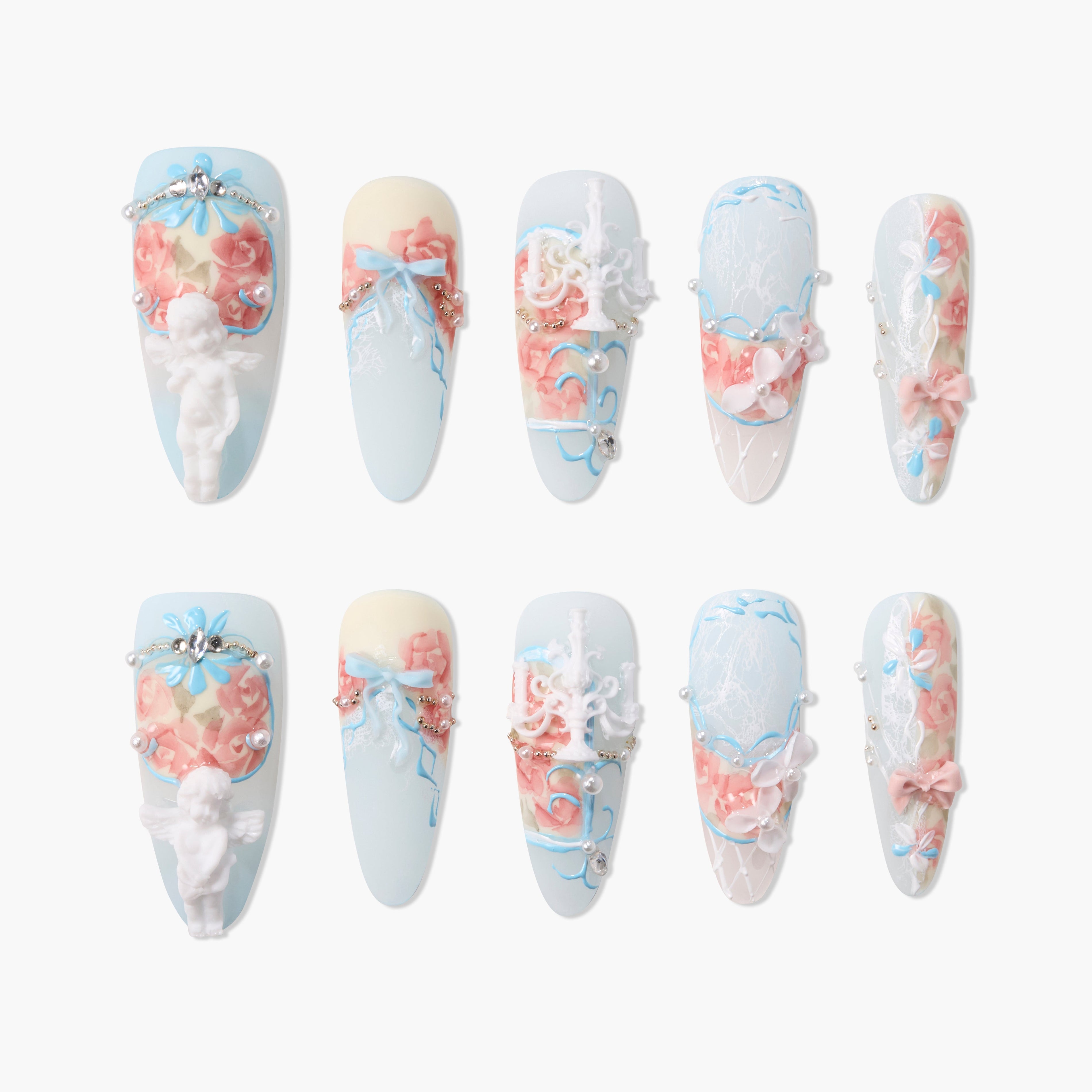 Handmade press-on nails with blue base, 3D angel, pastel roses, bows, and rhinestone accents