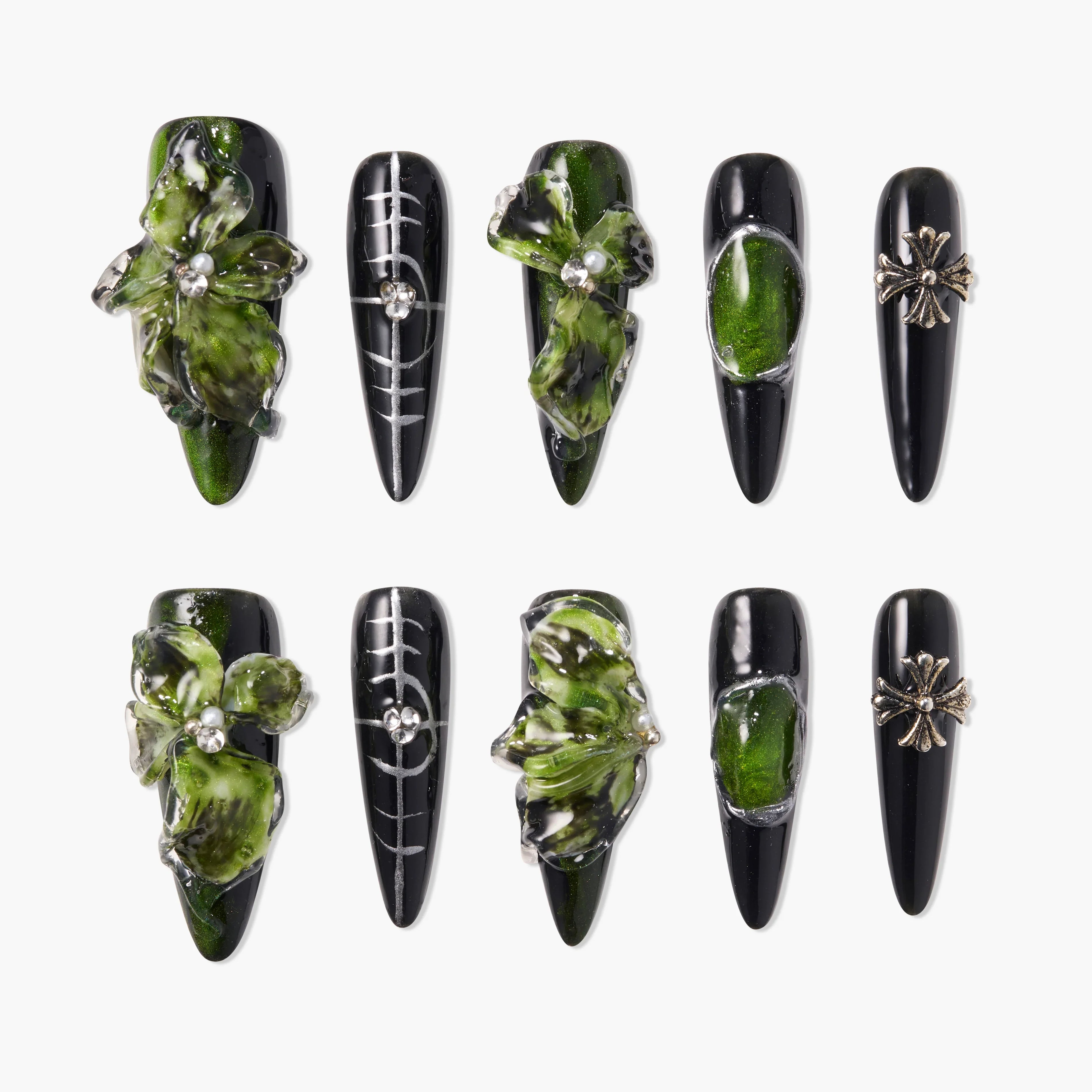 Handmade press-on nails with black base, green 3D floral designs, metallic accents, and rhinestones