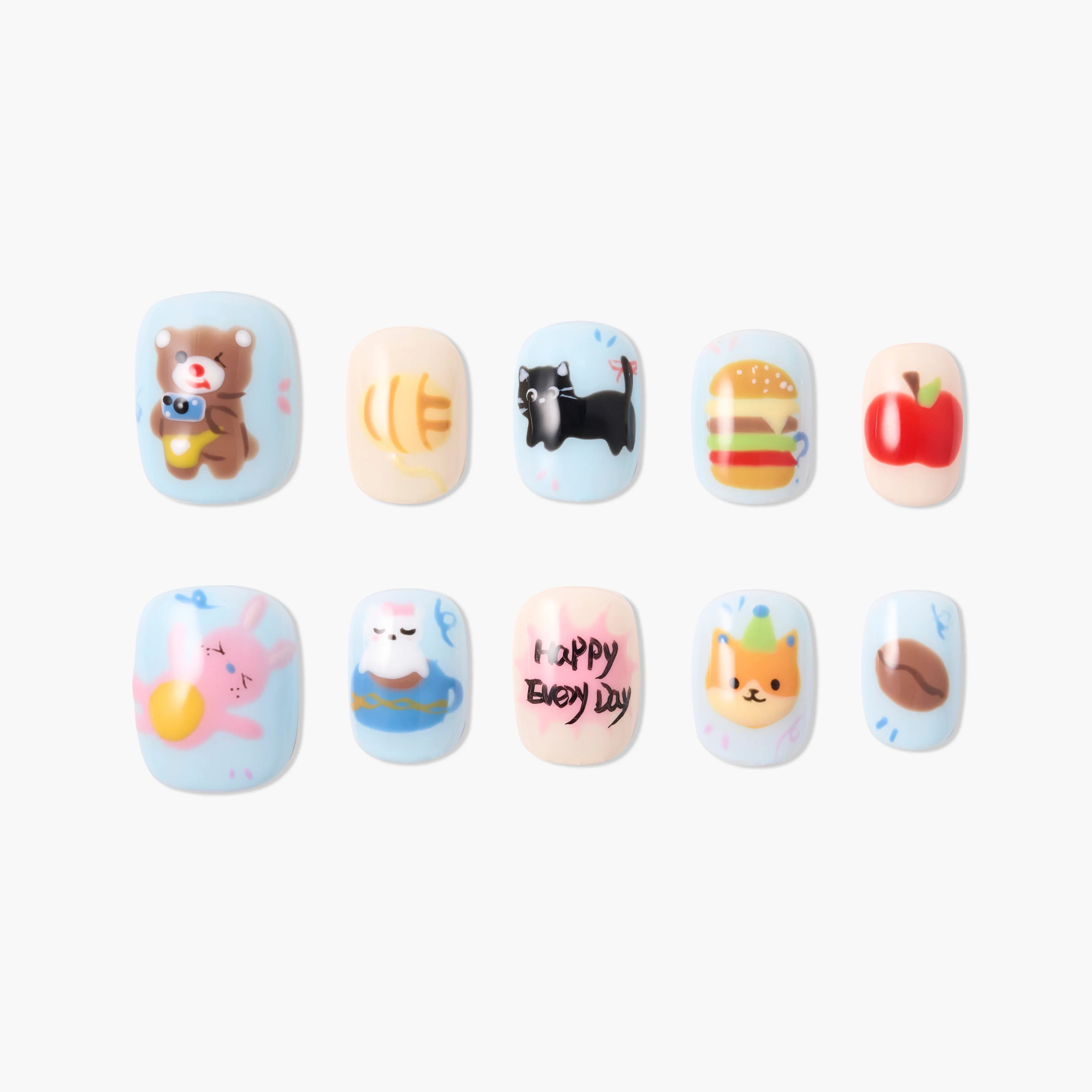 Handmade press-on nails with cartoon animal, food, and happy day designs on pastel backgrounds