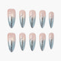 Set of long pink and silver ombre press-on nails with glossy finish and pearl accents