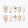 Handmade press-on nails with pink and green marble, gold foil, and pearl accents on white base