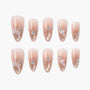 Pink ombre press-on nails with pearl and rhinestone 3D accents, elegant nail art set