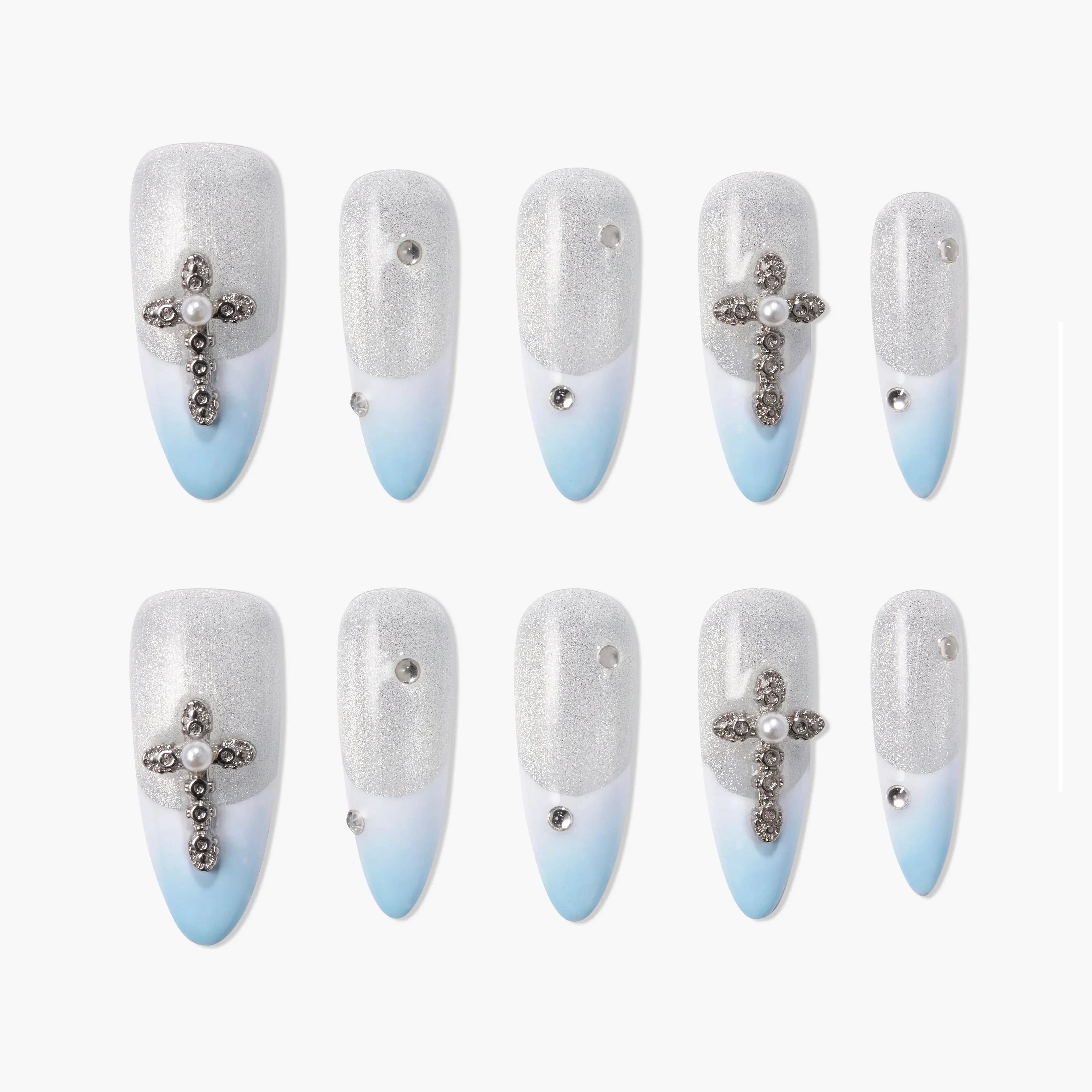 Silver and blue ombre press-on nails with crystal cross and rhinestone accents