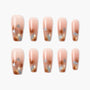 Handmade press-on nails with nude base and brown, blue, and gold marbled design